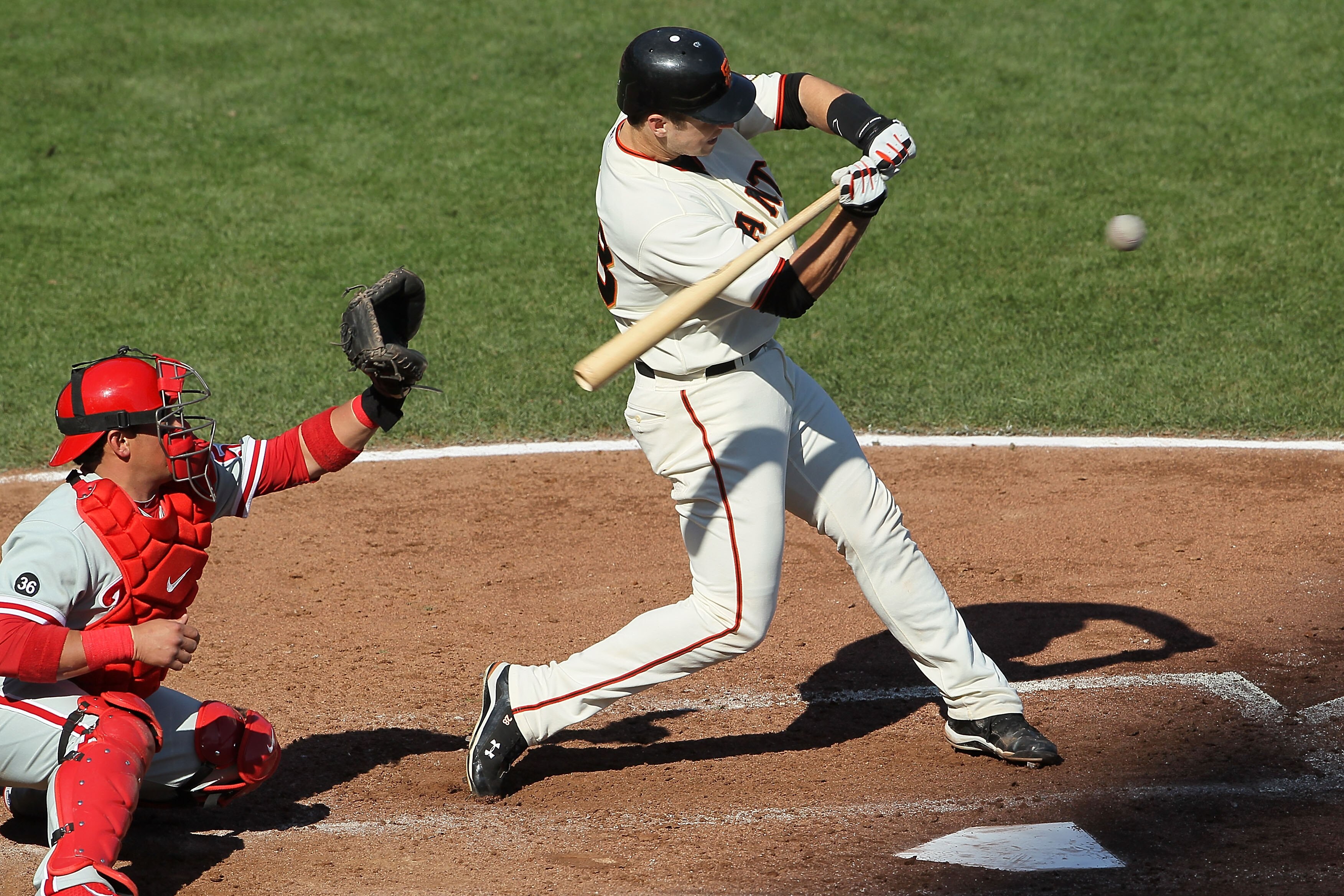 SAN FRANCISCO - OCTOBER 19:  Buster Posey #28 of the San Francisco Giants at bat against the Philadelphia Phillies in Game Three of the NLCS during the 2010 MLB Playoffs at AT&T Park on October 19, 2010 in San Francisco, California.  (Photo by Justin Sull