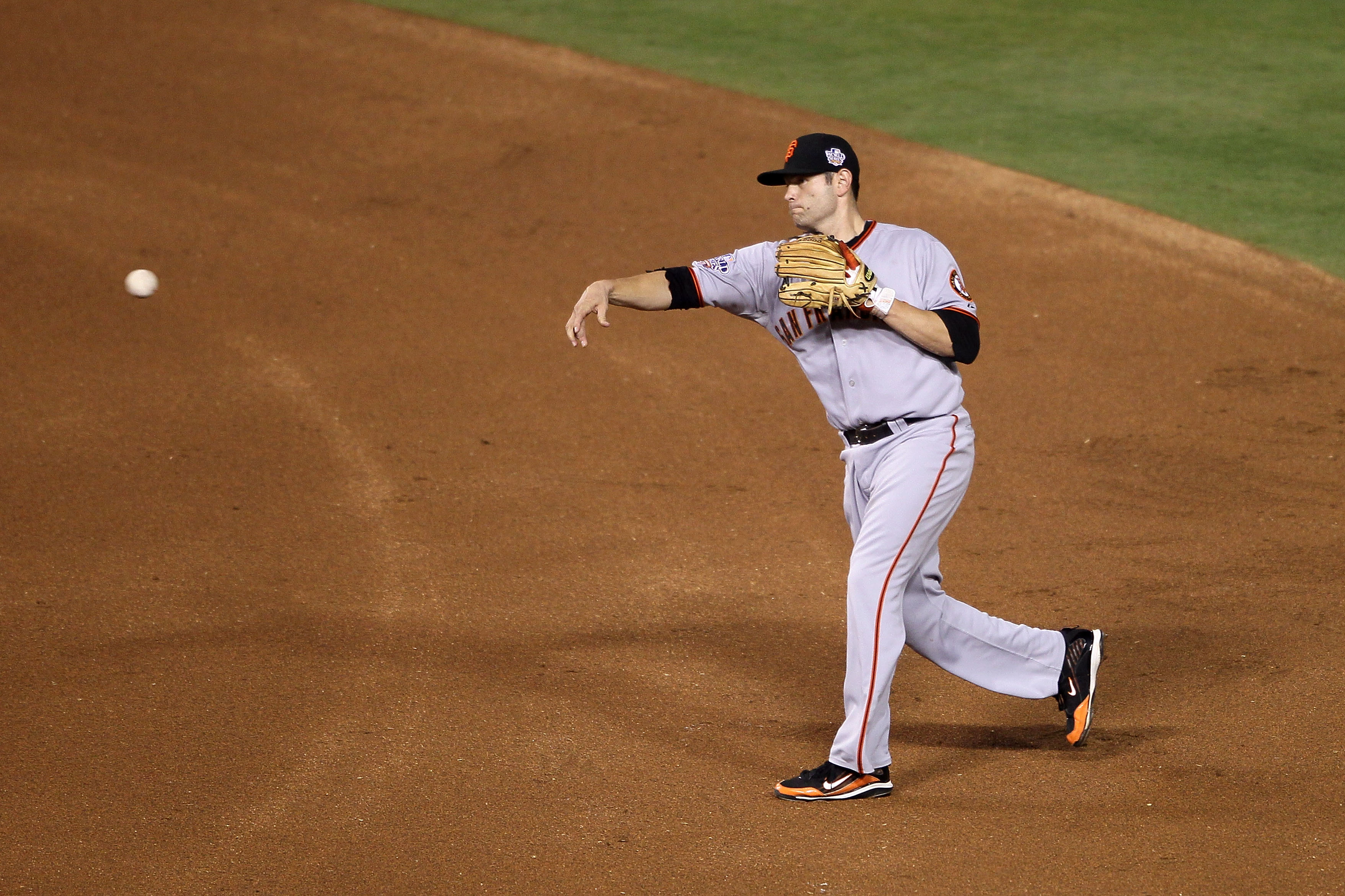 ARLINGTON, TX - NOVEMBER 01:  Freddy Sanchez #21 of the San Francisco Giants throws the ball to first base for a force out against the Texas Rangers in Game Five of the 2010 MLB World Series at Rangers Ballpark in Arlington on November 1, 2010 in Arlingto