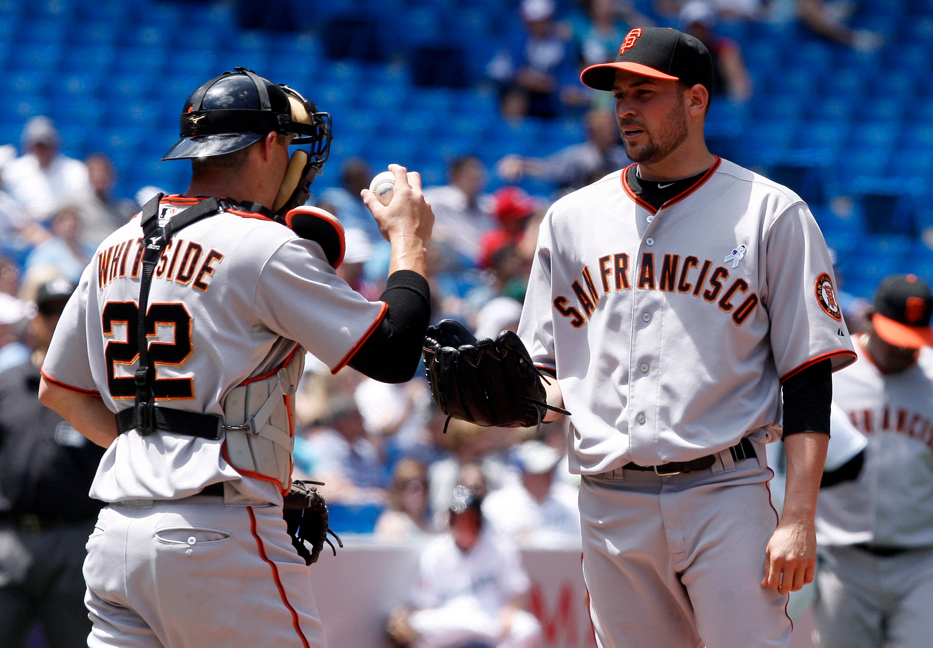 TORONTO - JUNE 20: Eli Whiteside #22 talks to Jonathan Sanchez #57 of the San Francisco Giants at the Rogers Centre during a MLB game against the Toronto Blue Jays June 20, 2010 in Toronto, Ontario, Canada. (Photo by Abelimages/Getty Images)