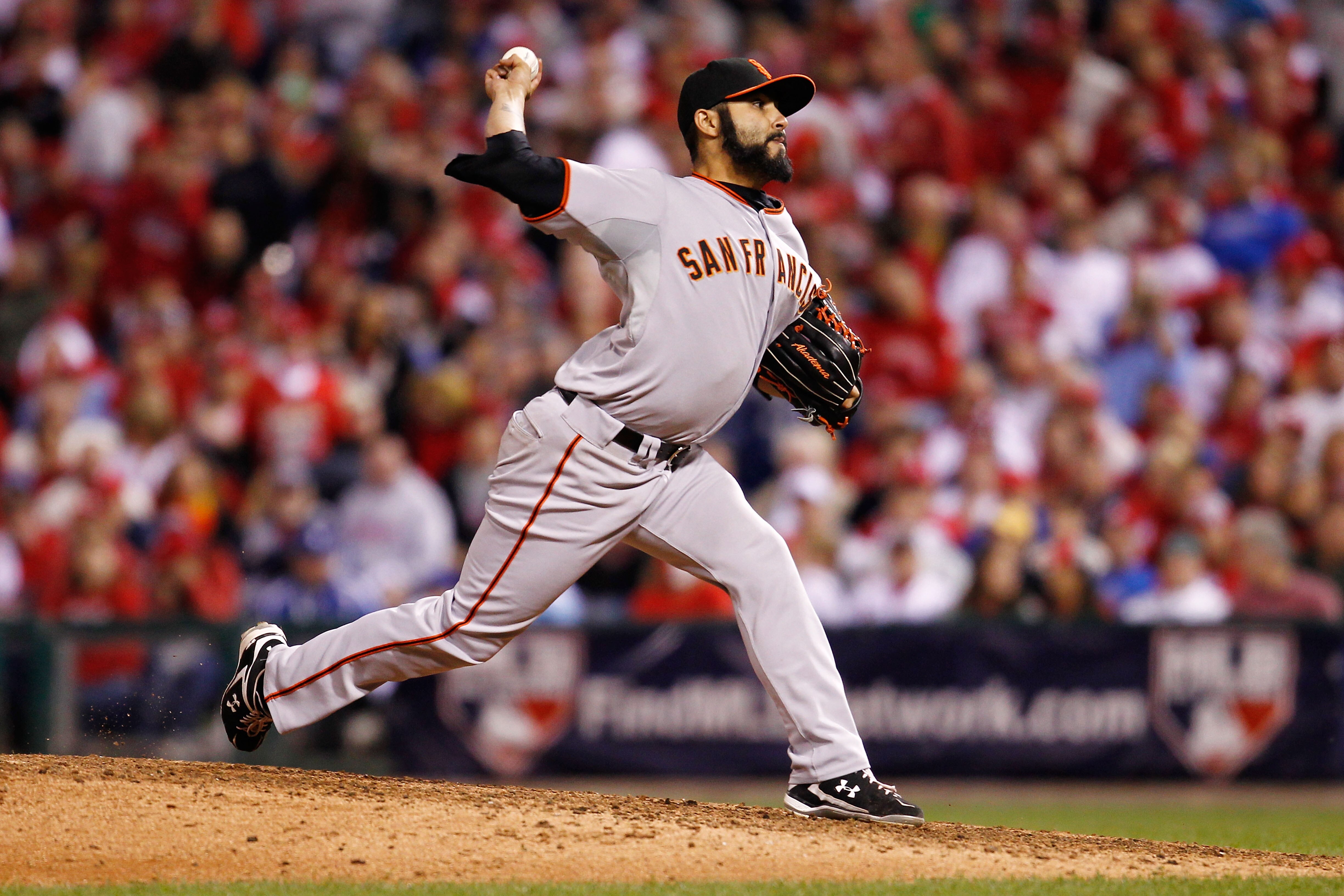 PHILADELPHIA - OCTOBER 17:  Sergio Romo #54 of the San Francisco Giants pitches against the Philadelphia Phillies in Game Two of the NLCS during the 2010 MLB Playoffs at Citizens Bank Park on October 17, 2010 in Philadelphia, Pennsylvania.  (Photo by Jeff