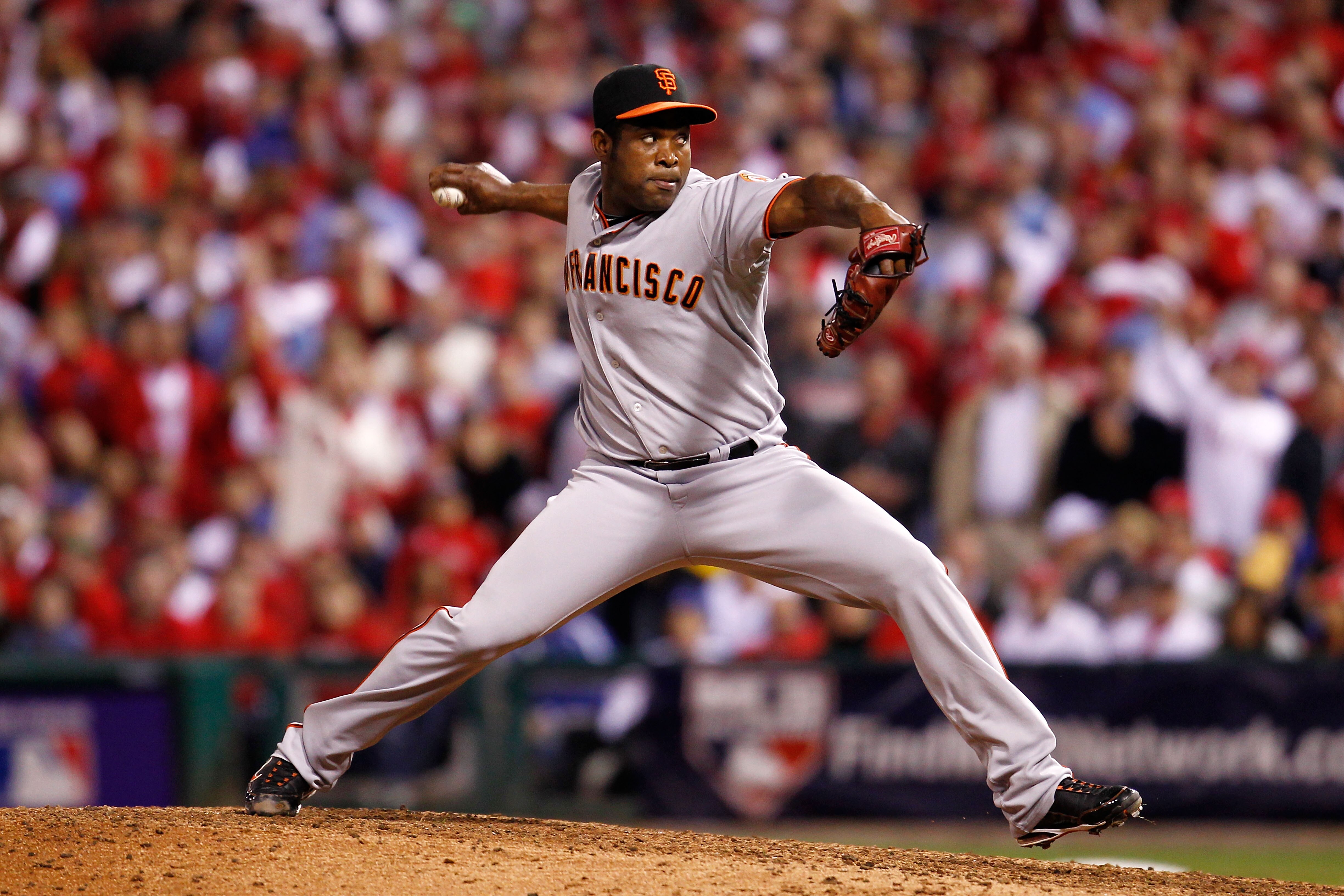 PHILADELPHIA - OCTOBER 17:  Santiago Casilla #46 of the San Francisco Giants pitches in the seventh inning against the Philadelphia Phillies in Game Two of the NLCS during the 2010 MLB Playoffs at Citizens Bank Park on October 17, 2010 in Philadelphia, Pe