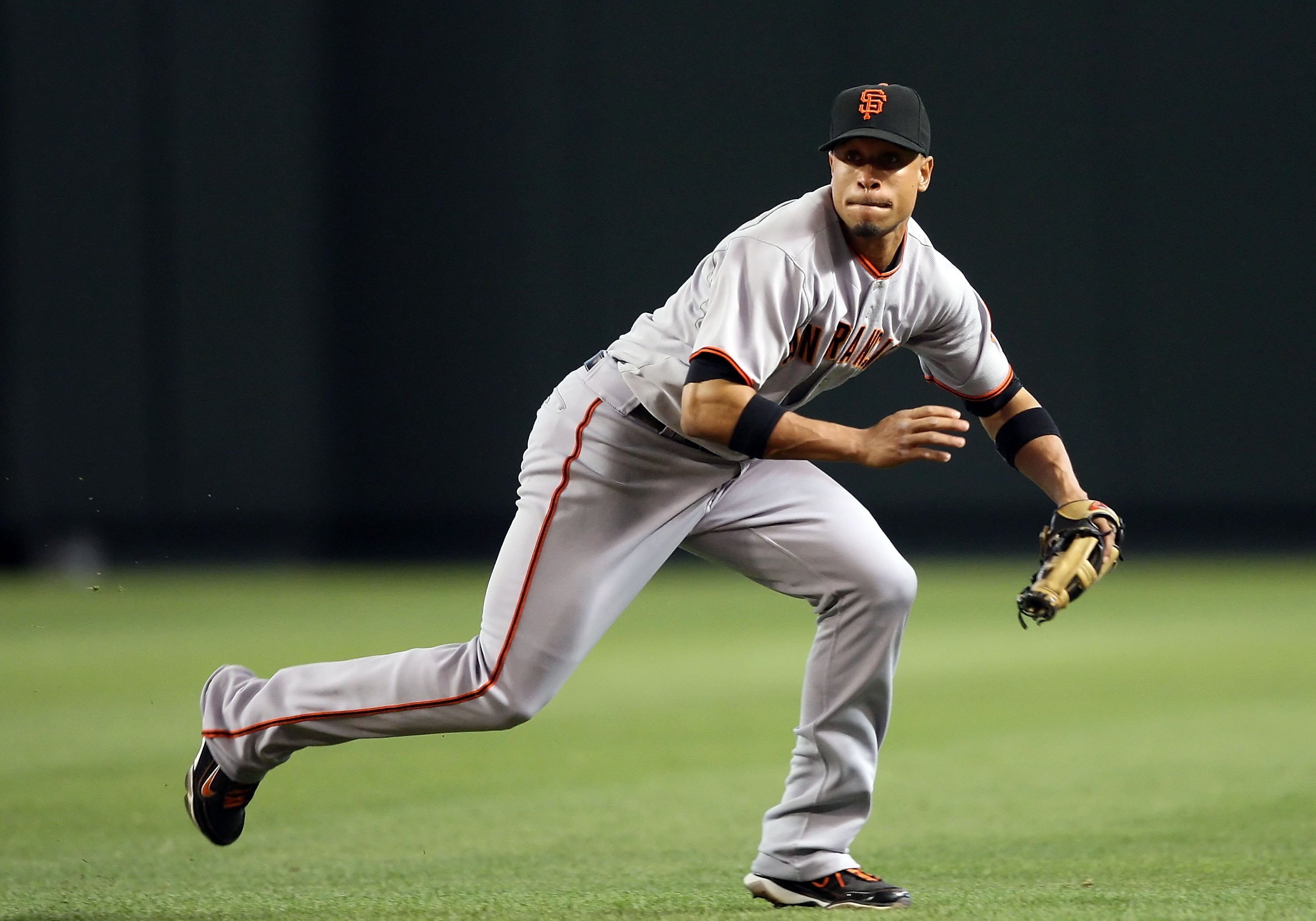 PHOENIX - JUNE 11:  Infielder Emmanuel Burriss #7 of the San Francisco Giants in action during the major league baseball game against the Arizona Diamondbacks at Chase Field on June 11, 2009 in Phoenix, Arizona.  The Diamondbacks defeated the Giants 2-1.