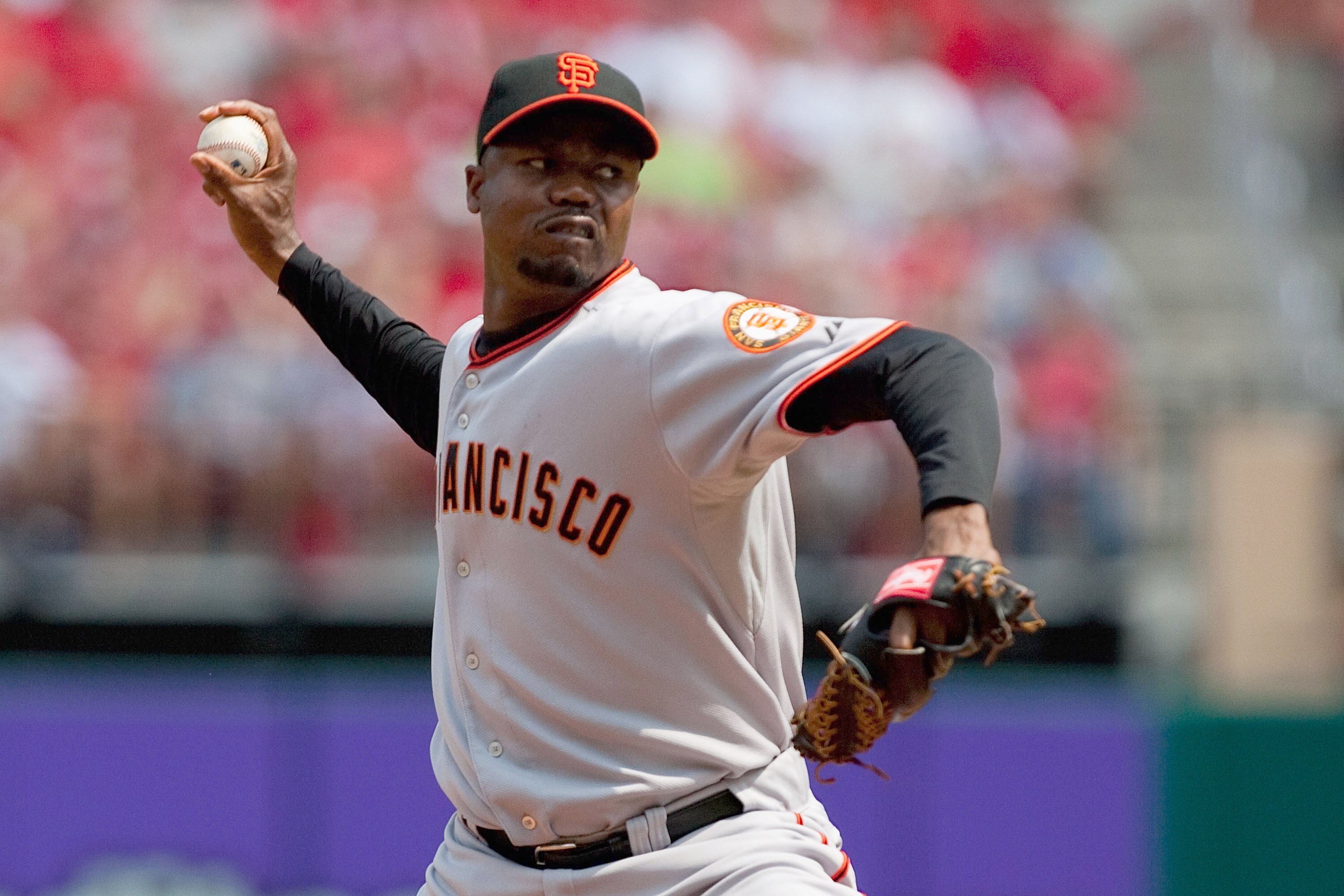 ST. LOUIS - AUGUST 22: Reliever Guillermo Mota #59 of the San Francisco Giants pitches against the St. Louis Cardinals at Busch Stadium on August 22, 2010 in St. Louis, Missouri.  (Photo by Dilip Vishwanat/Getty Images)