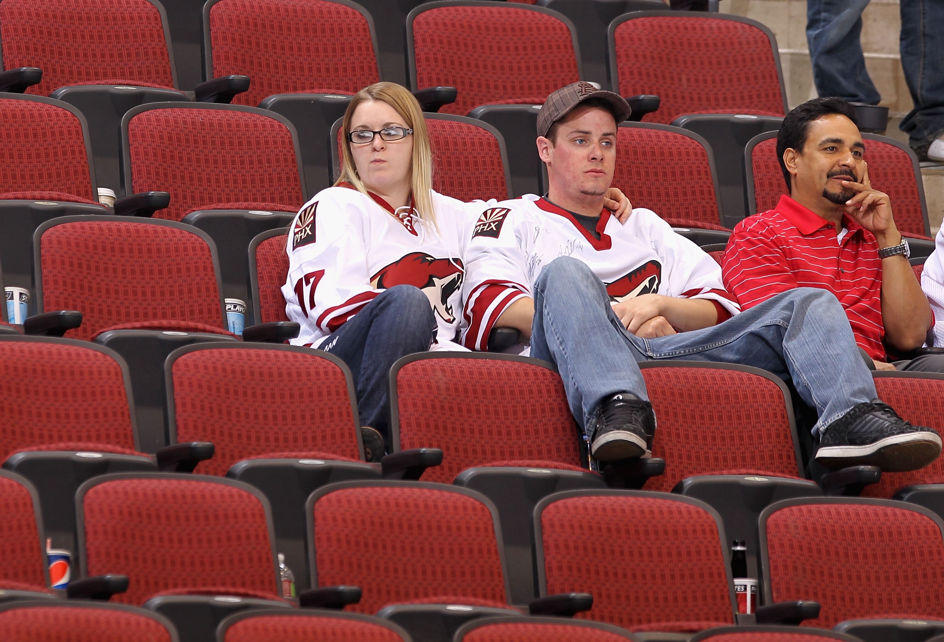 GLENDALE, AZ - APRIL 27:  Fans of the Phoenix Coyotes react after being defeated by the Detroit Red Wings in Game Seven of the Western Conference Quarterfinals during the 2010 NHL Stanley Cup Playoffs at Jobing.com Arena on April 27, 2010 in Glendale, Ari
