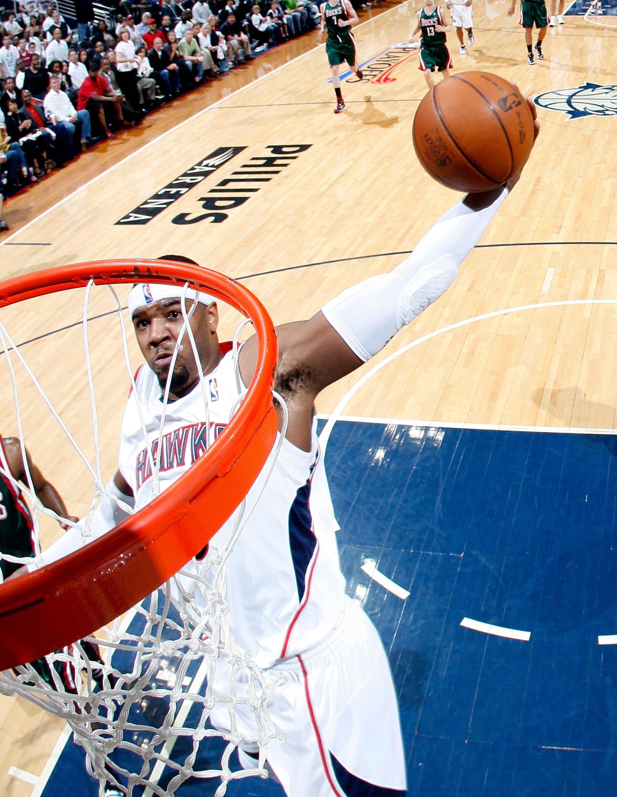 ATLANTA - APRIL 20:  Josh Smith #5 of the Atlanta Hawks goes up for a dunk against the Milwaukee Bucks at Philips Arena on April 20, 2010 in Atlanta, Georgia.  NOTE TO USER: User expressly acknowledges and agrees that, by downloading and/or using this Pho