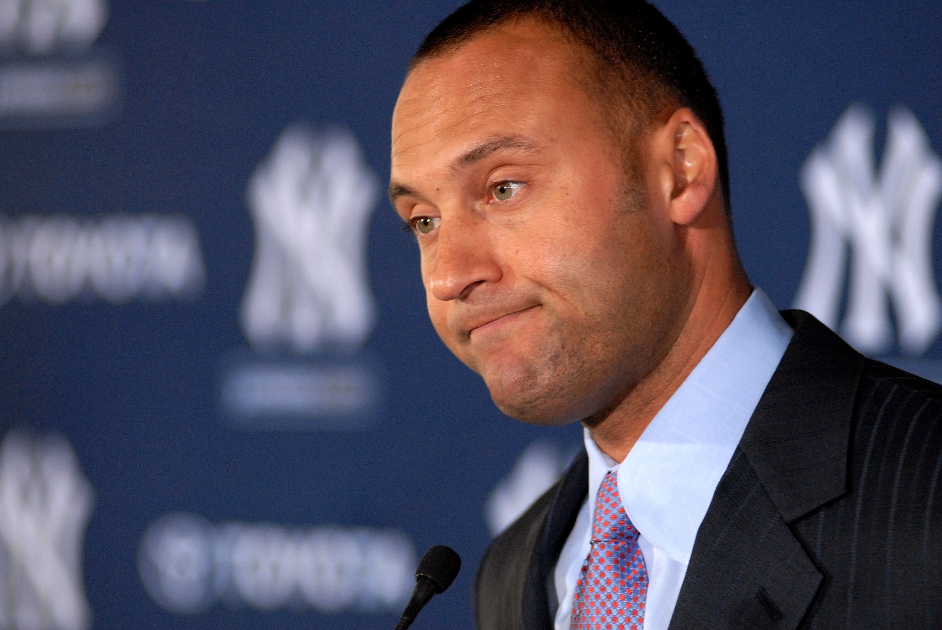 TAMPA, FL - DECEMBER 07:   Shortstop Derek Jeter of the New York Yankees talks to the media during a press conference to announce his new contract with the club on December 7, 2010 in Tampa, Florida.  (Photo by Tim Boyles/Getty Images)