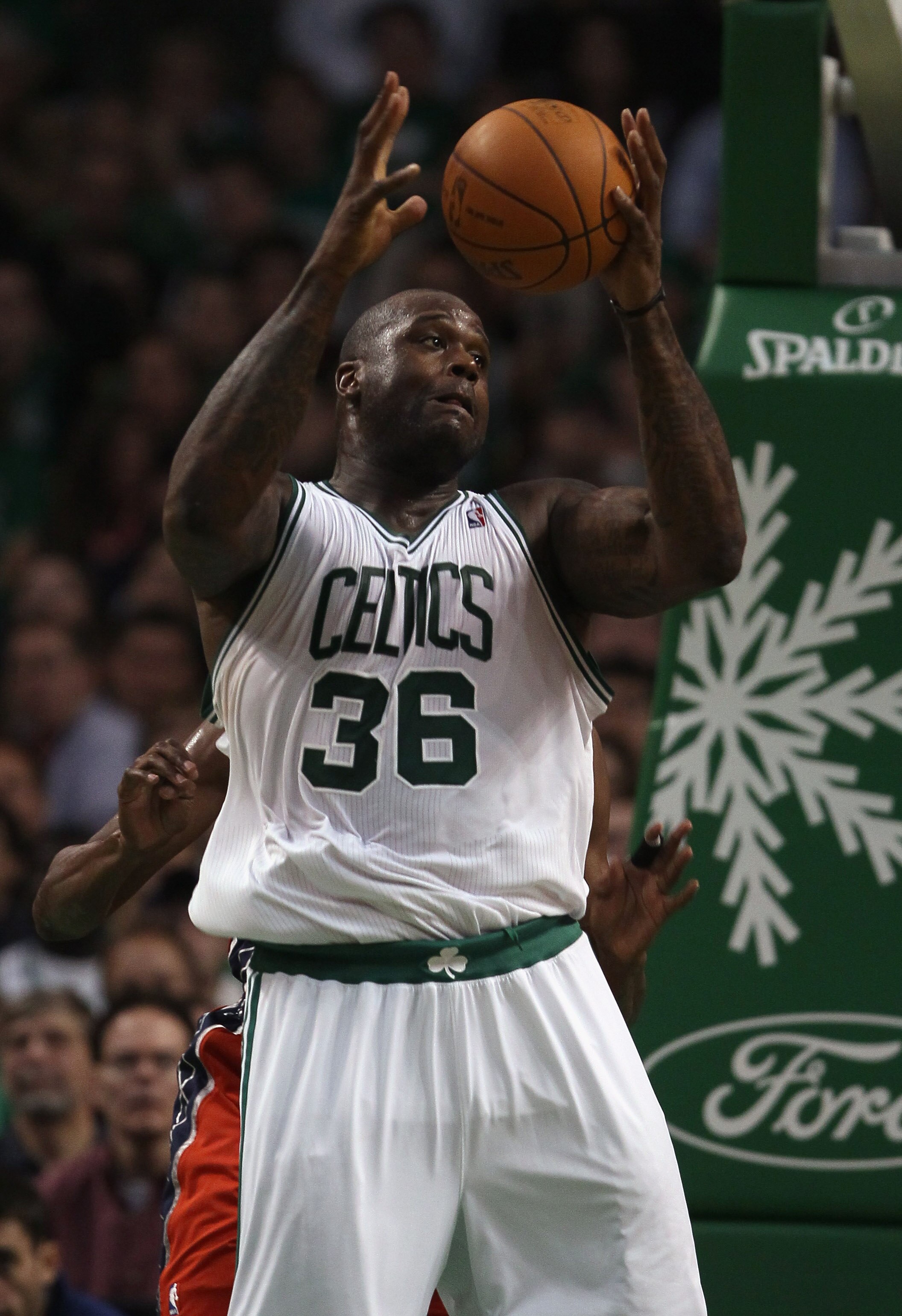 BOSTON - NOVEMBER 24:  Shaquille O'Neal #36 of the Boston Celtics grabs the ball in the second half against the New Jersey Nets on November 24, 2010 at the TD Garden in Boston, Massachusetts. The Celtics defeated the nets 89-83. NOTE TO USER: User express