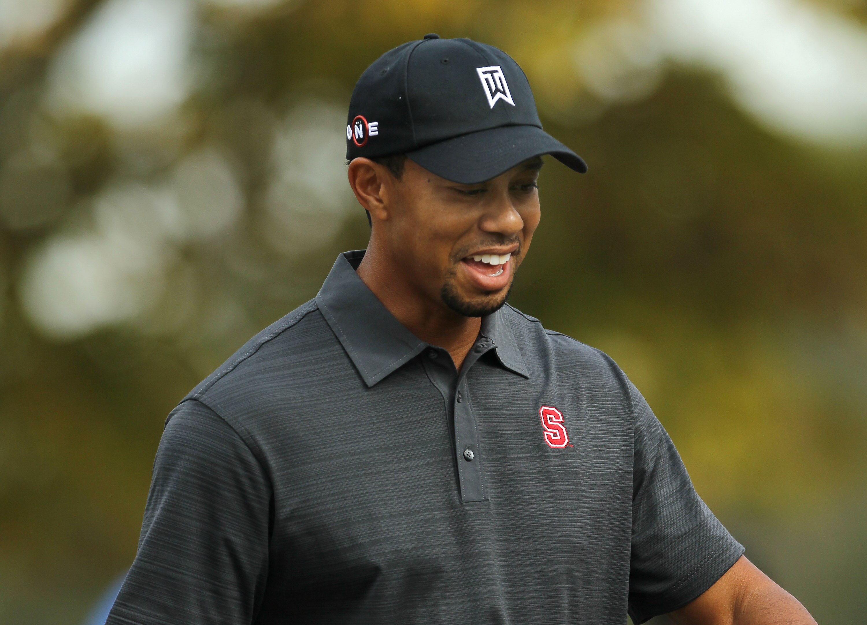 THOUSAND OAKS, CA - DECEMBER 03:  Tiger Woods laughs as he walks down the fairway on the fifth hole during round two of the Chevron World Challenge at Sherwood Country Club on December 3, 2010 in Thousand Oaks, California.  (Photo by Stephen Dunn/Getty Im