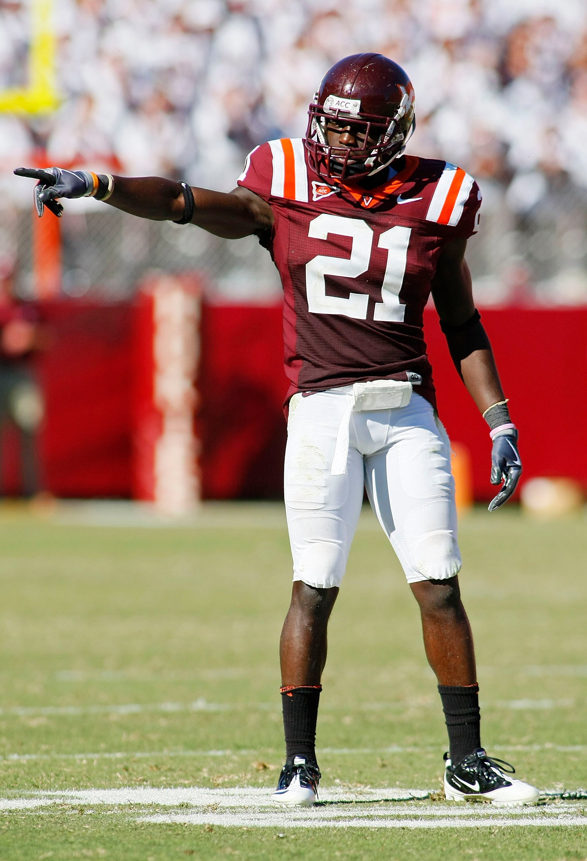 BLACKSBURG, VA - SEPTEMBER 18: Cornerback Rashad Carmichael #21 of the Virginia Tech Hokies signals on field against the East Carolina Pirates at Lane Stadium on September 18, 2010 in Blacksburg, Virginia. Virginia Tech won 49-27.  (Photo by Geoff Burke/G