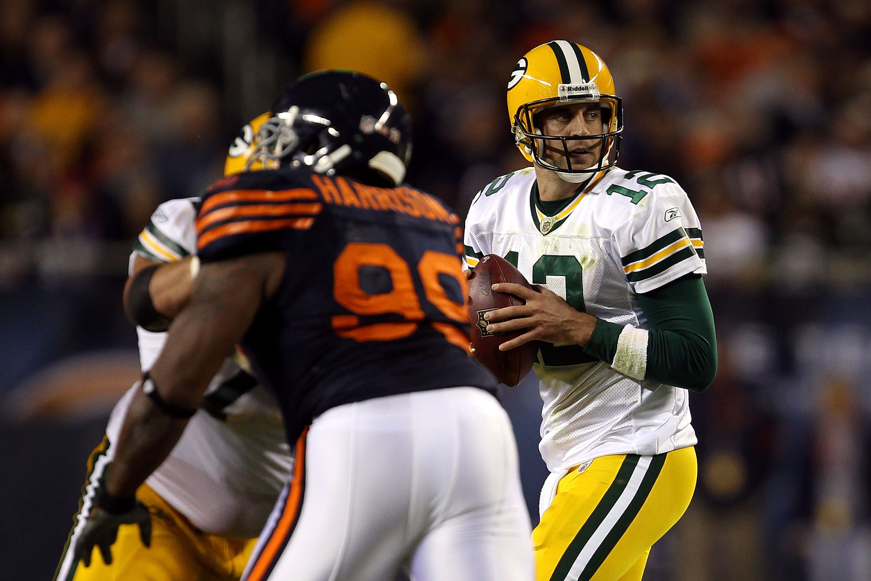 CHICAGO - SEPTEMBER 27:  Aaron Rodgers #12 of the Green Bay Packers drops back to pass against the Chicago Bears at Soldier Field on September 27, 2010 in Chicago, Illinois. The Bears won 20-17.  (Photo by Jonathan Daniel/Getty Images)