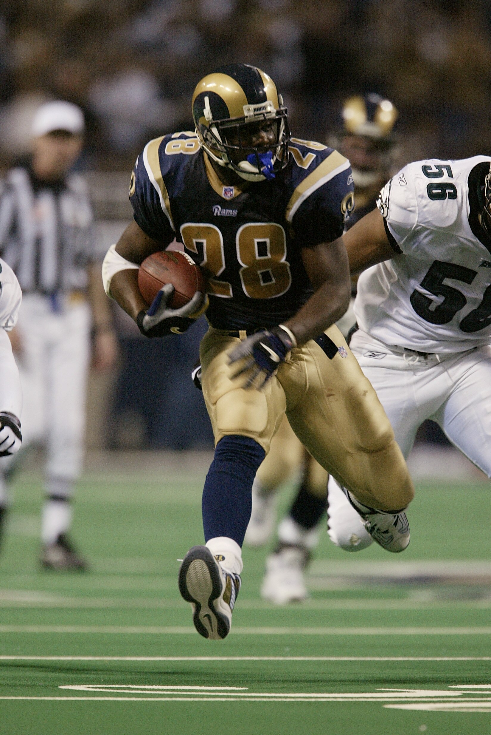 27 Jan 2002: Marshall Faulk of the St.Louis Rams in action during the NFC Championship Game against the Philadelphia Eagles at the Dome at  America's Center in St.Louis, Missouri. The Rams advance to the Superbowl after winning 29-24. DIGITAL IMAGE. Manda