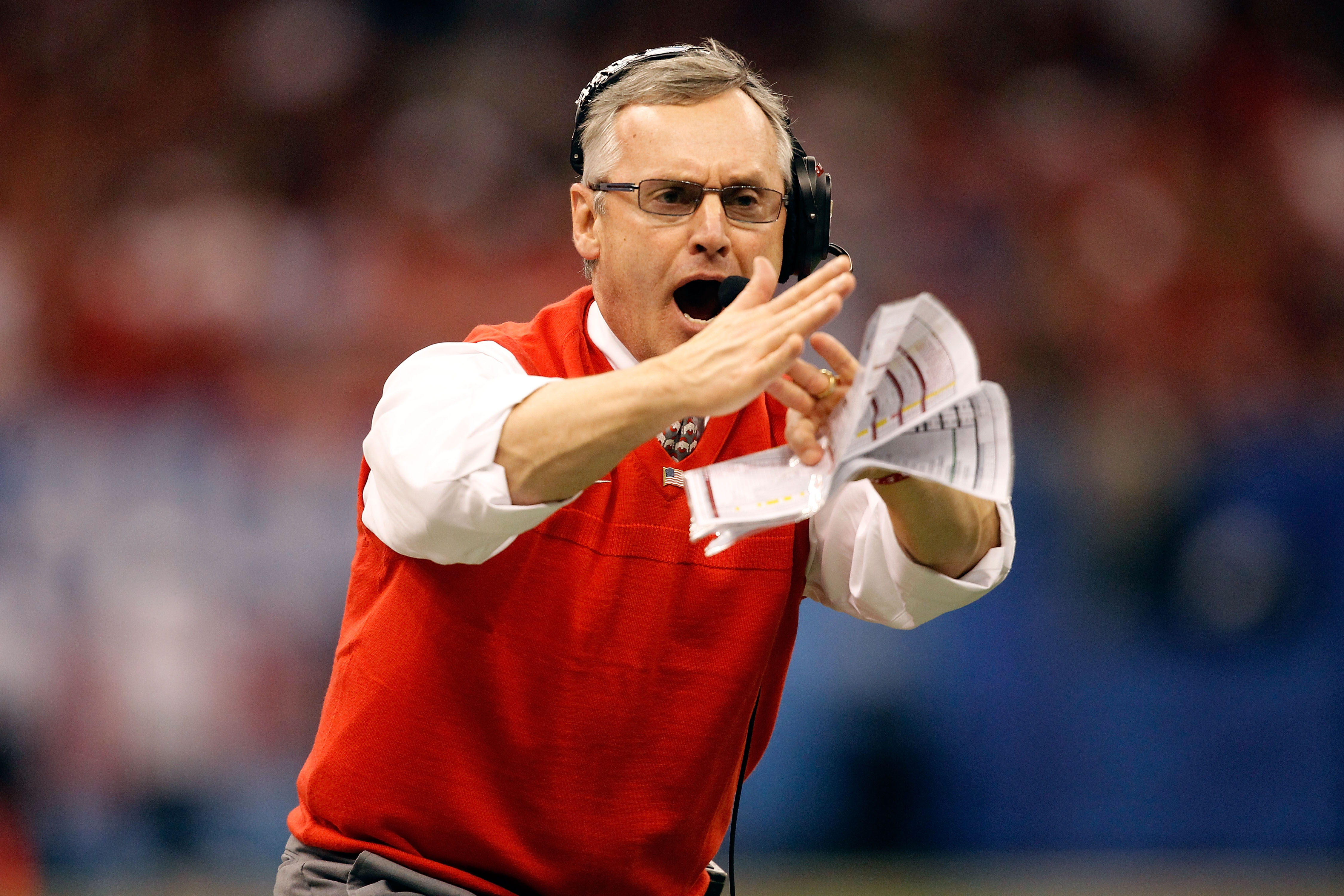 NEW ORLEANS, LA - JANUARY 04: Head coach Jim Tressel of the Ohio State Buckeyes calls a time out in the first half against the Arkansas Razorbacks during the Allstate Sugar Bowl at the Louisiana Superdome on January 4, 2011 in New Orleans, Louisiana. (P NEW ORLEANS, LA - JANUARY 04: Head coach Jim Tressel of the Ohio State Buckeyes calls a time out in the first half against the Arkansas Razorbacks during the Allstate Sugar Bowl at the Louisiana Superdome on January 4, 2011 in New Orleans, Louisiana. (P