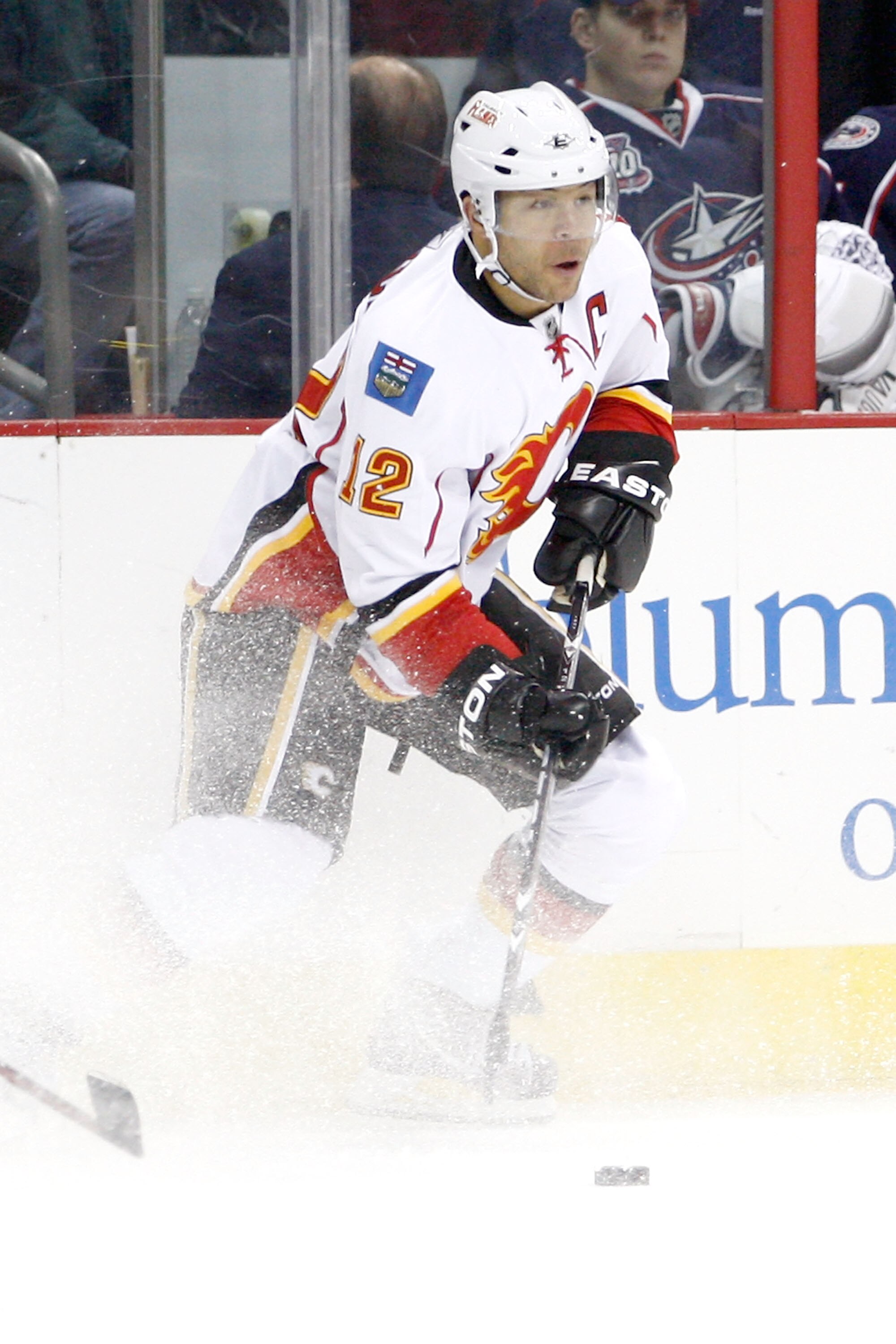 COLUMBUS, OH - DECEMBER 21:  Jarome Iginla #12 of the Calgary Flames skates with the puck during a game against the Columbus Blue Jackets on December 21, 2010 at Nationwide Arena in Columbus, Ohio.  (Photo by John Grieshop/Getty Images)