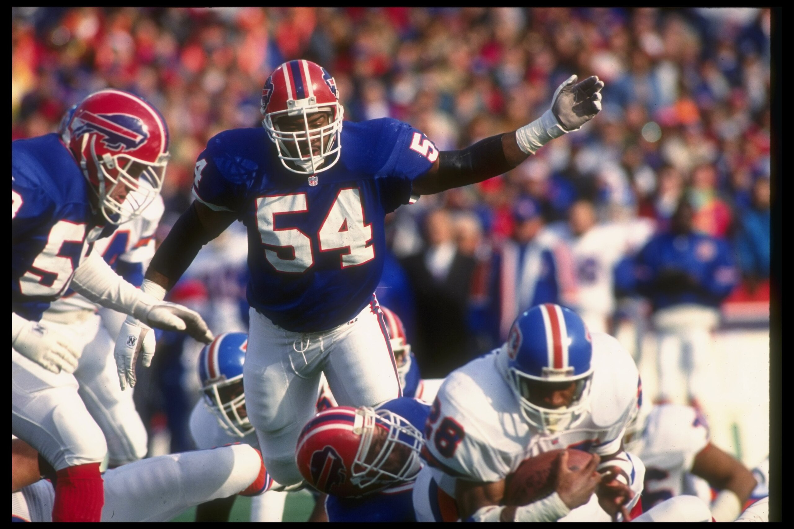 12 Jan 1992:  Linebacker Carlton Bailey of the Buffalo Bills works against the Denver Broncos during a playoff game at Rich Stadium in Orchard Park, New York.  The Bills won the game, 10-7. Mandatory Credit: Rick Stewart  /Allsport