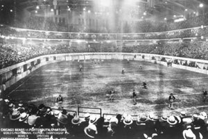 The Bears and Portsmouth Spartans in the first NFL Playoff game and indoor game.