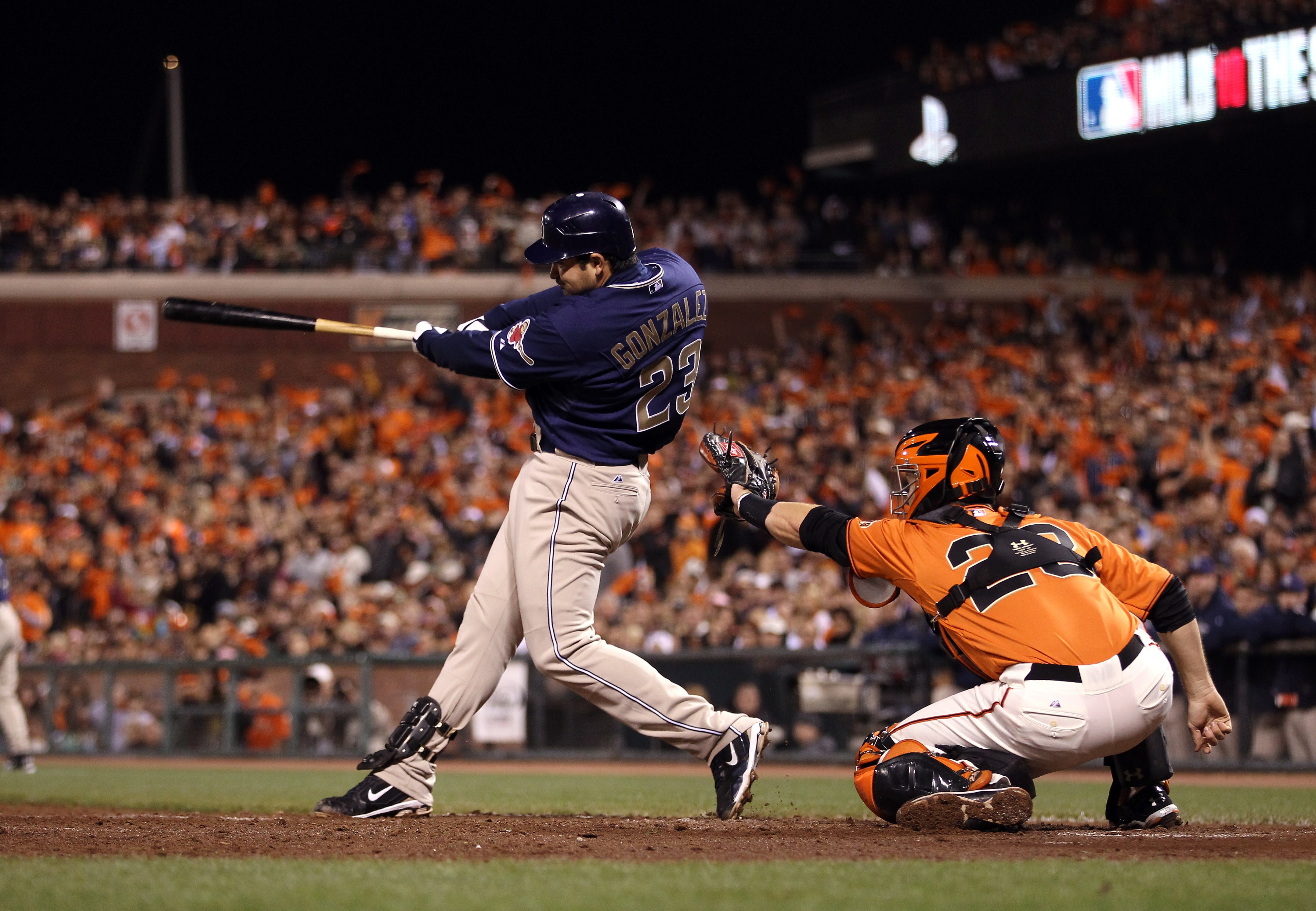 SAN FRANCISCO - OCTOBER 01:  Adrain Gonzalez #23 of the San Diego Padres hits a three-run home run to give the Padres a 4-0 over the San Francisco Giants in the third inning at AT&T Park on October 1, 2010 in San Francisco, California.  (Photo by Ezra Sha
