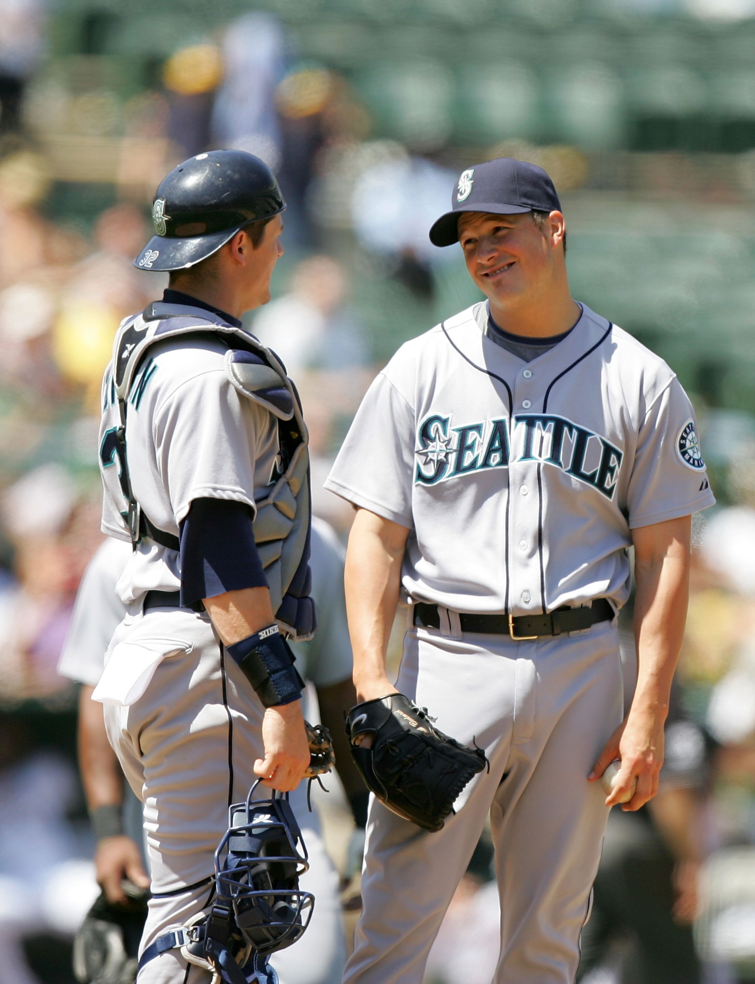 OAKLAND, CA - MAY 27: Erik Bedard #45 of the Seattle Mariners talks to catcher Rob Johnson #32 before he is taken out of their game against the Oakland Athletics at the Oakland Coliseum on May 27, 2009 in Oakland, California. (Photo by Ezra Shaw/Getty I OAKLAND, CA - MAY 27: Erik Bedard #45 of the Seattle Mariners talks to catcher Rob Johnson #32 before he is taken out of their game against the Oakland Athletics at the Oakland Coliseum on May 27, 2009 in Oakland, California. (Photo by Ezra Shaw/Getty I