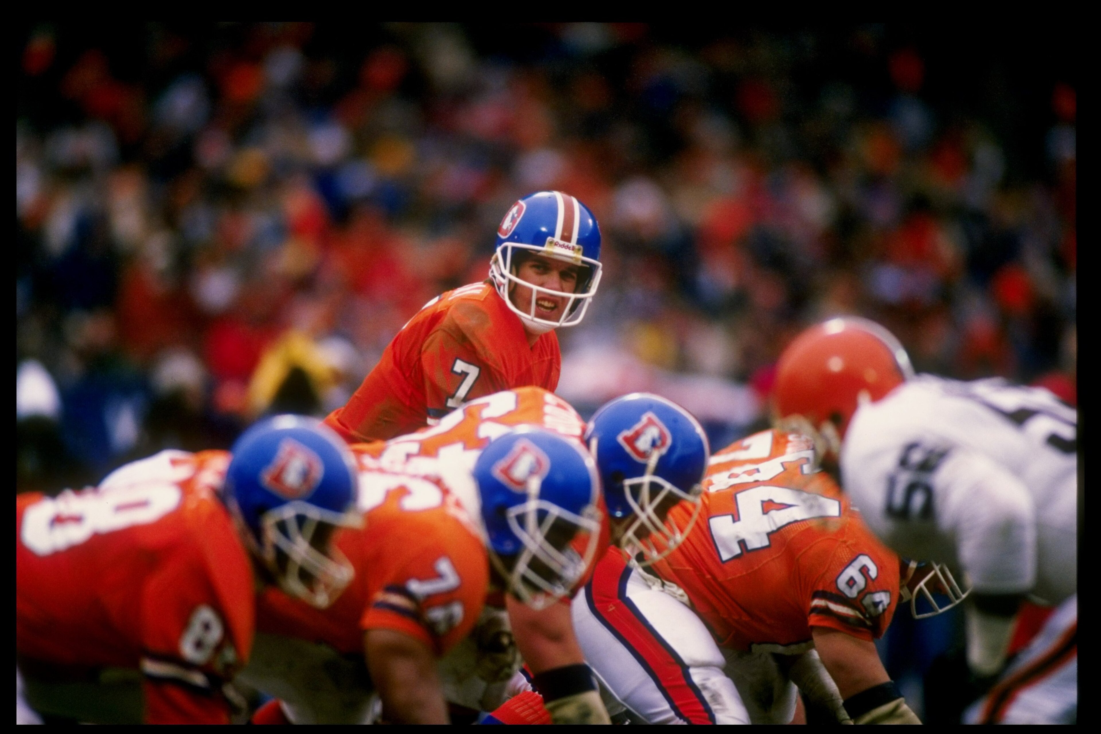 11 Jan 1987:  Quarterback John Elway of the Denver Broncos calls the cadence during the AFC Championship Game against the Cleveland Browns at Cleveland Stadium in Cleveland, Ohio.  The Broncos won the game 23-20. Mandatory Credit: Bob Martin  /Allsport