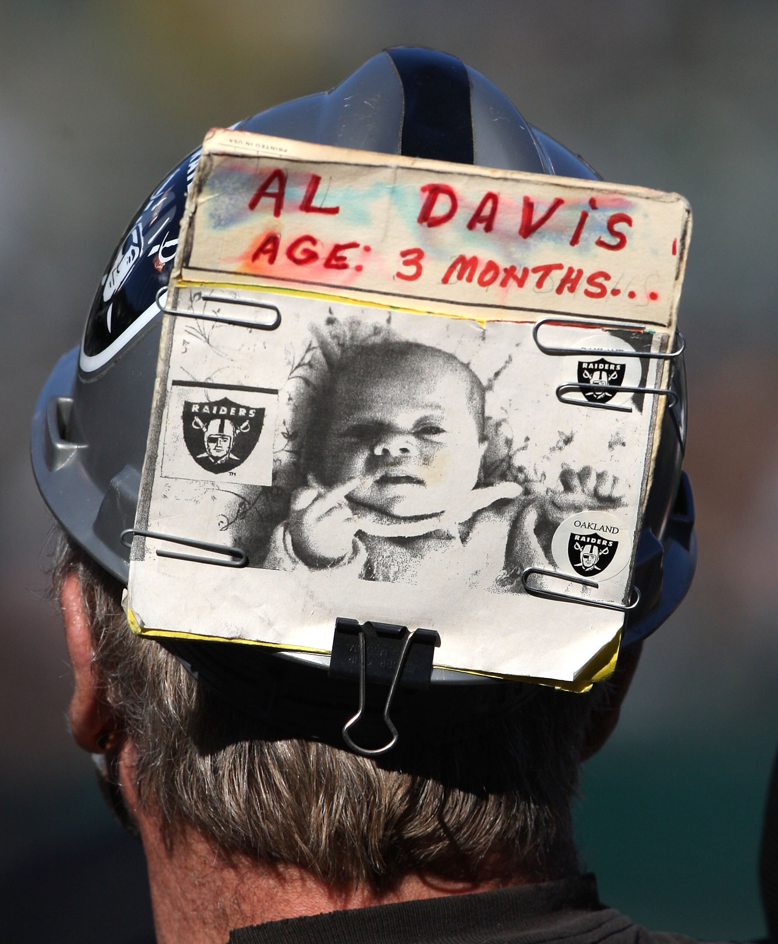 OAKLAND, CA - JANUARY 03:  A fan of the Oakland Raiders looks on against the Baltimore Ravens during an NFL game at Oakland-Alameda County Coliseum on January 3, 2010 in Oakland, California.  (Photo by Jed Jacobsohn/Getty Images)