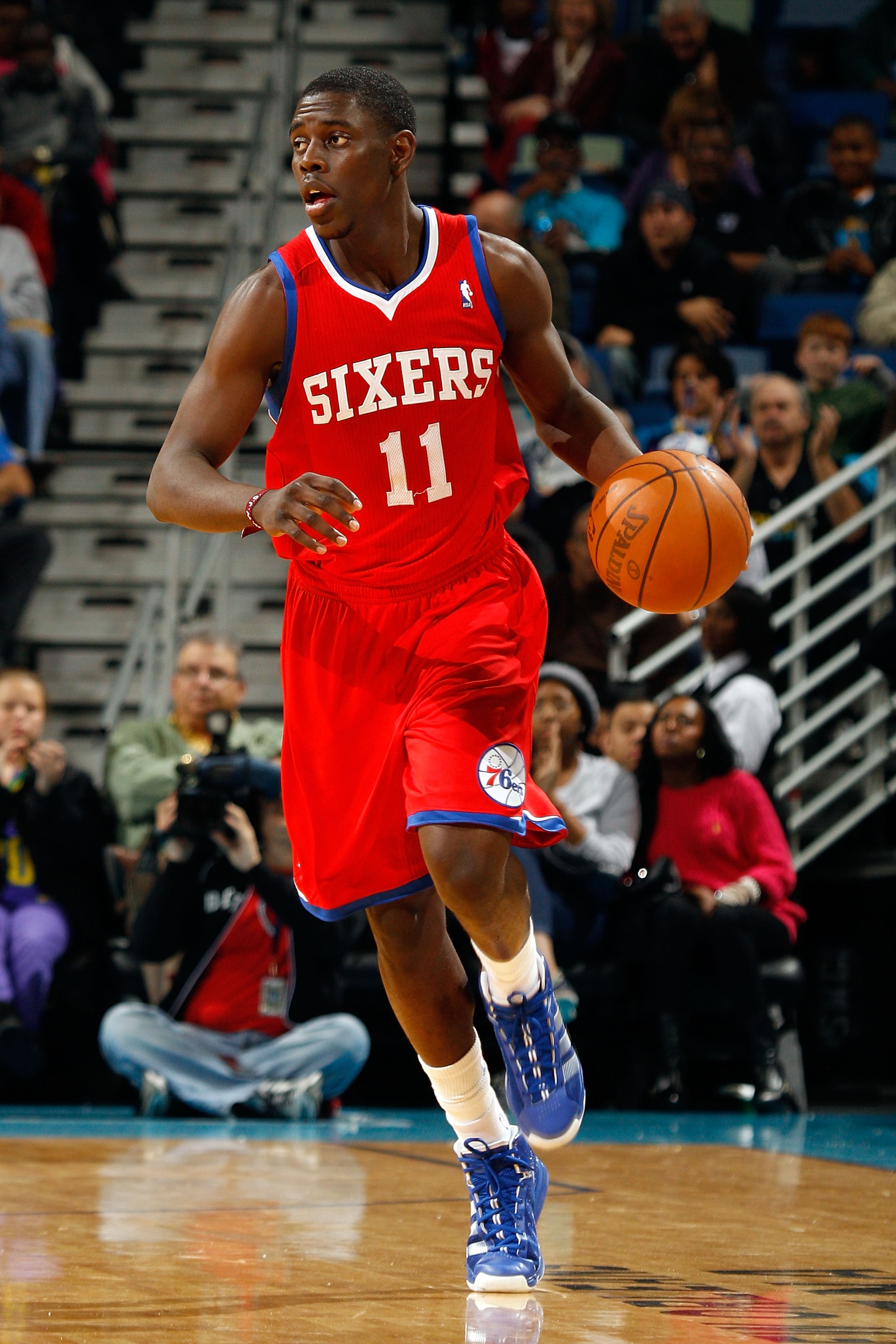 NEW ORLEANS, LA - JANUARY 03: Jrue Holiday #11 of the Philadelphia 76ers moves the ball against the New Orleans Hornets at New Orleans Arena on January 3, 2011 in New Orleans, Louisiana. NOTE TO USER: User expressly acknowledges and agrees that, by downl NEW ORLEANS, LA - JANUARY 03: Jrue Holiday #11 of the Philadelphia 76ers moves the ball against the New Orleans Hornets at New Orleans Arena on January 3, 2011 in New Orleans, Louisiana. NOTE TO USER: User expressly acknowledges and agrees that, by downl