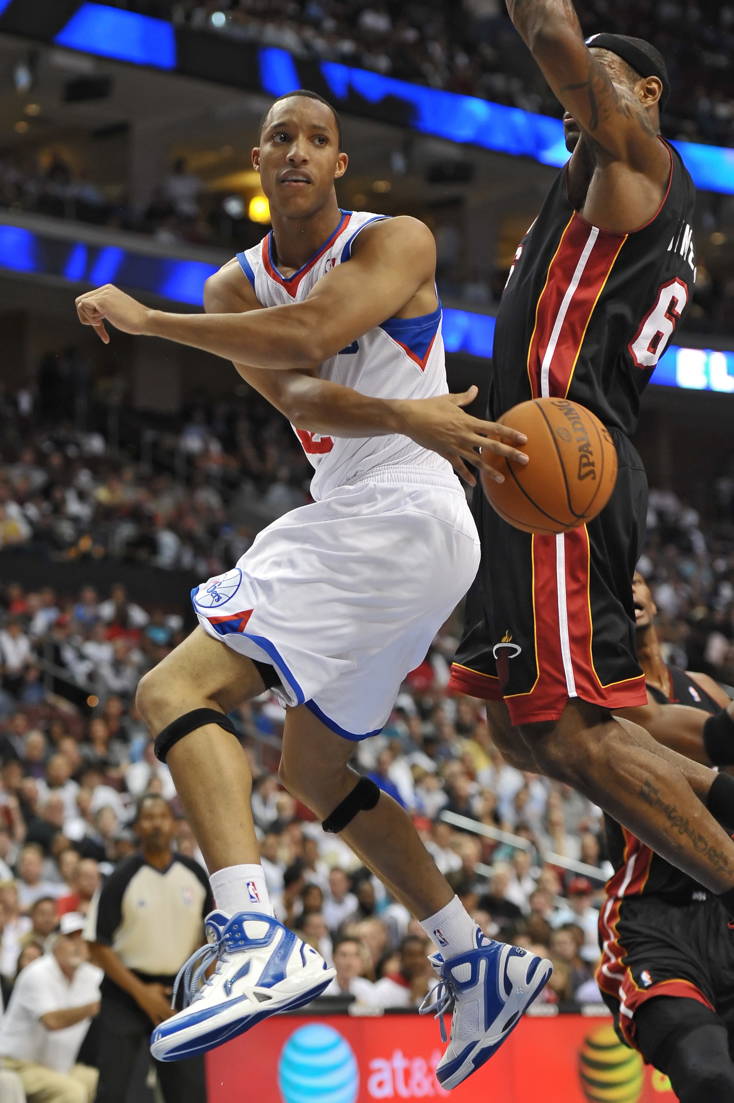 PHILADELPHIA - OCTOBER 27: Evan Turner #12 of the Philadelphia 76ers passes the ball around LeBron James #6 of the Miami Heat at the Wells Fargo Center on October 27, 2010 in Philadelphia, Pennsylvania. NOTE TO USER: User expressly acknowledges and agree PHILADELPHIA - OCTOBER 27: Evan Turner #12 of the Philadelphia 76ers passes the ball around LeBron James #6 of the Miami Heat at the Wells Fargo Center on October 27, 2010 in Philadelphia, Pennsylvania. NOTE TO USER: User expressly acknowledges and agree