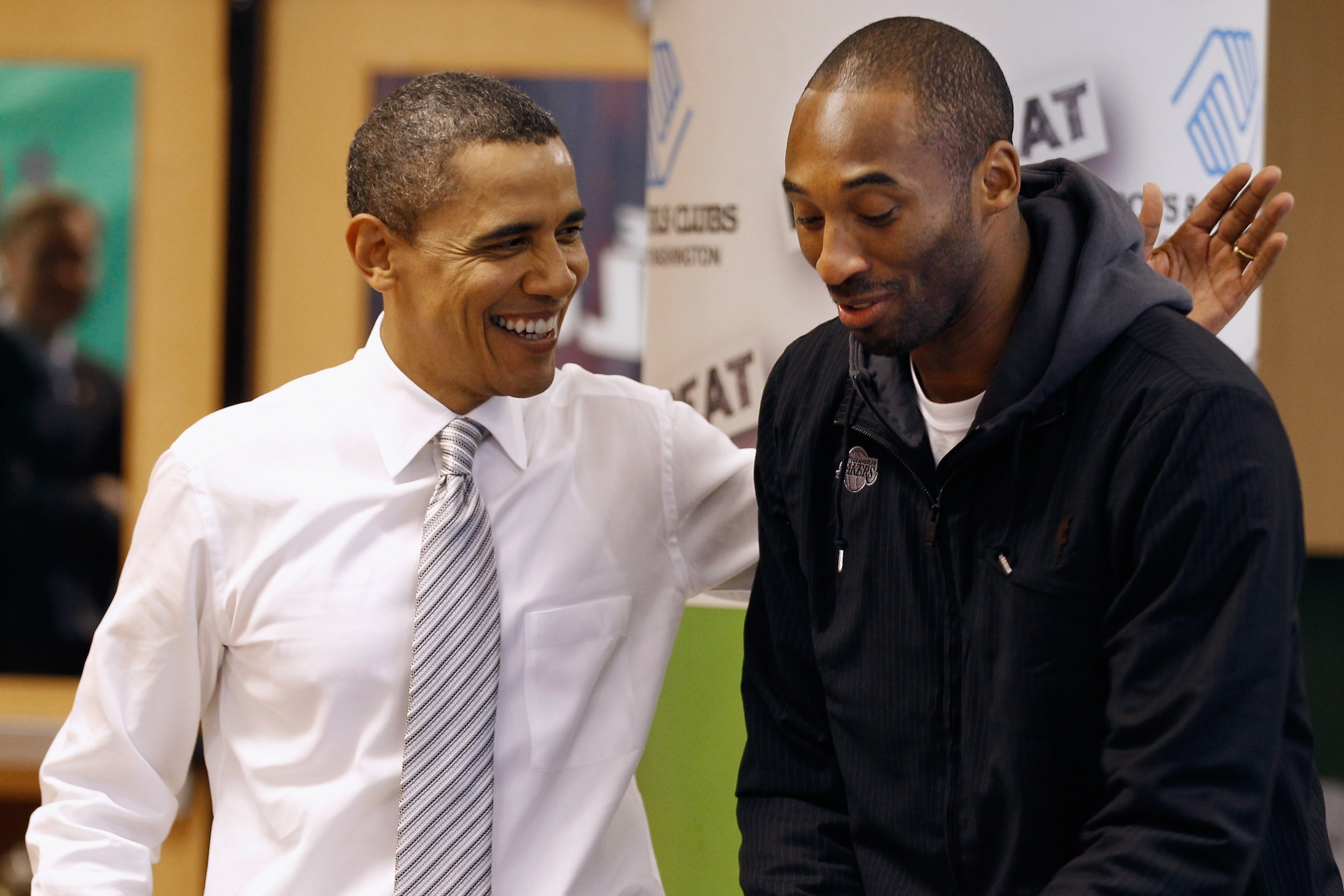 WASHINGTON, DC - DECEMBER 13:  (AFP OUT) U.S. President Barack Obama (L) talks with Kobe Bryant of the Los Angeles Lakers while filling care packages during a NBA Cares service event at the Boys and Girls Club at THEARC  December 13, 2010 in Washington, D