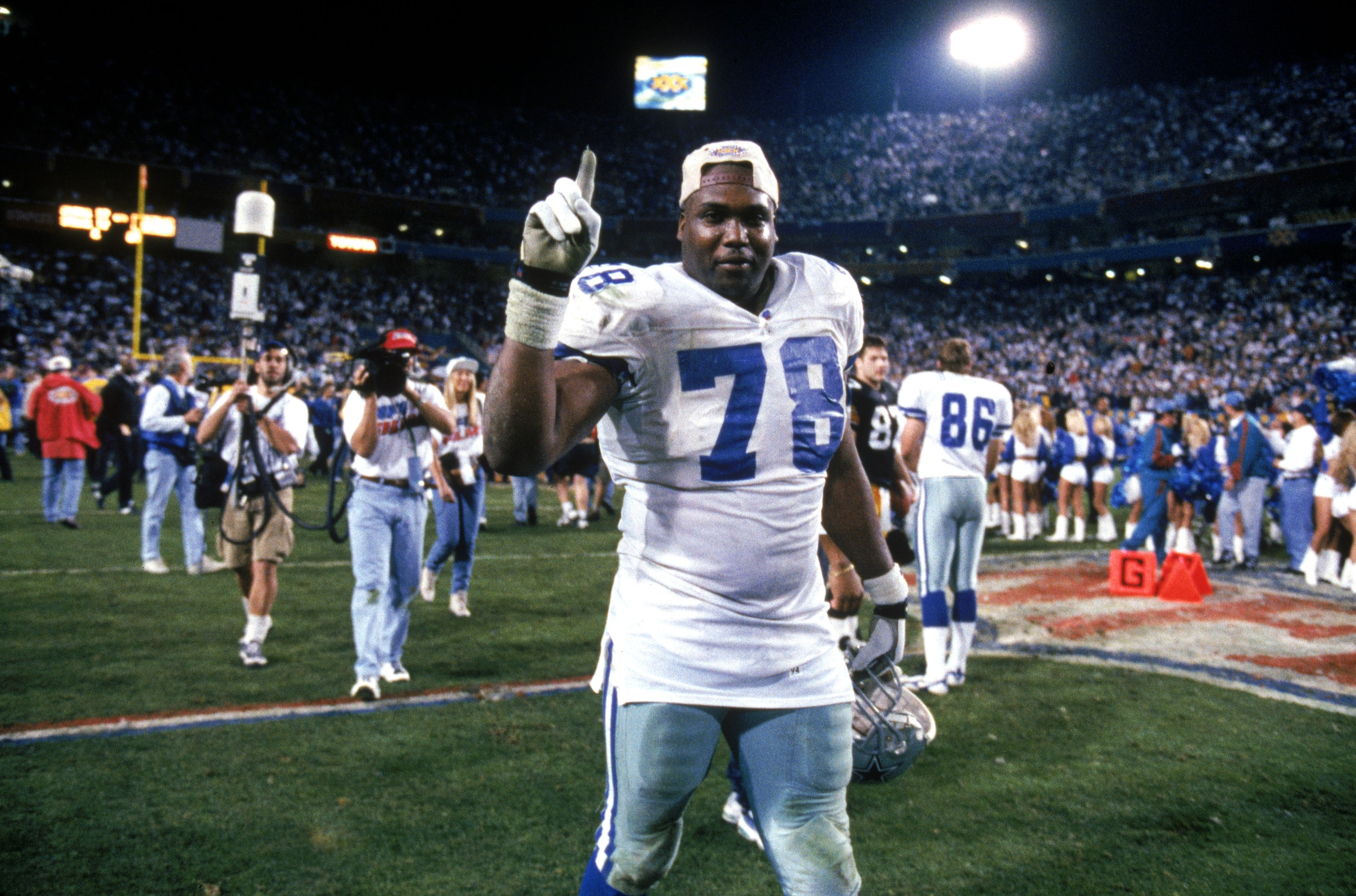 TEMPE, AZ - JANUARY 28:  Defensive end Leon Lett #78 of the Dallas Cowboys celebrates after the Cowboys victory over the Pittsburgh Steelers in Super Bowl XXX at Sun Devil Stadium on January 28, 1996 in Tempe, Arizona.  The Cowboys won 27-17.  (Photo by G