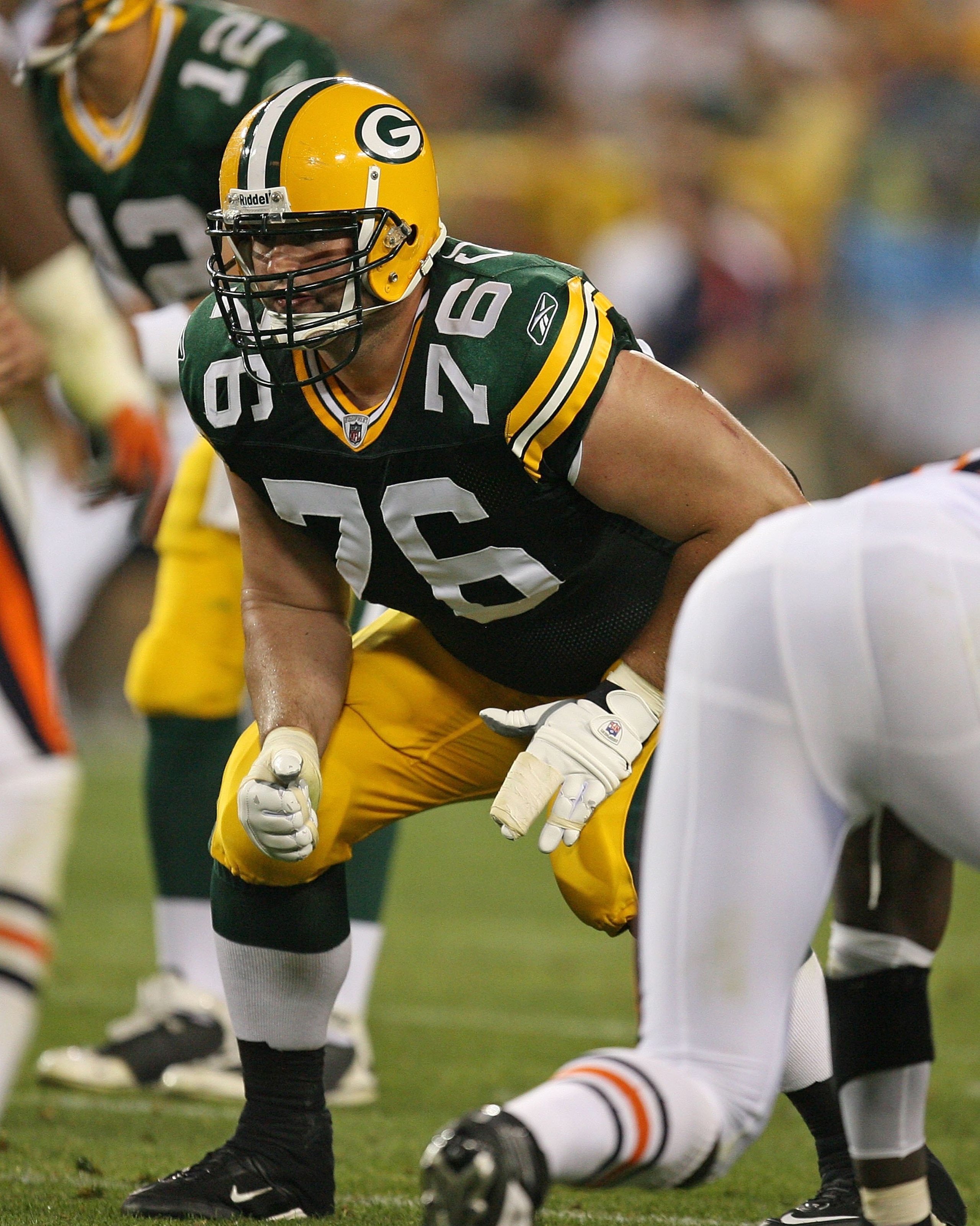 GREEN BAY, WI - SEPTEMBER 13: Chad Clifton #76 of the Green Bay Packers awaits the start of a play against the Chicago Bears on September 13, 2009 at Lambeau Field in Green Bay, Wisconsin. The Packers defeated the Bears 21-15. (Photo by Jonathan Daniel/Ge