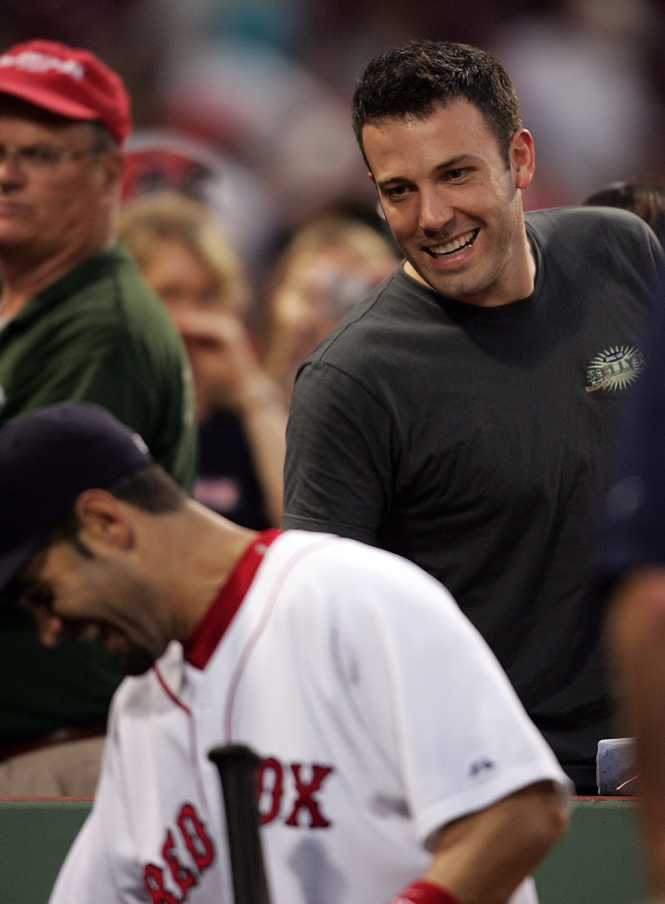 BOSTON - JUNE 02:  Actor Ben Affleck jokes with Mike Lowell #25 of the Boston Red Sox after the game against the New York Yankees on June 2, 2007 at Fenway Park in Boston, Massachusetts. The Red Sox defeated the Yankees 11-6.  (Photo by Elsa/Getty Images)