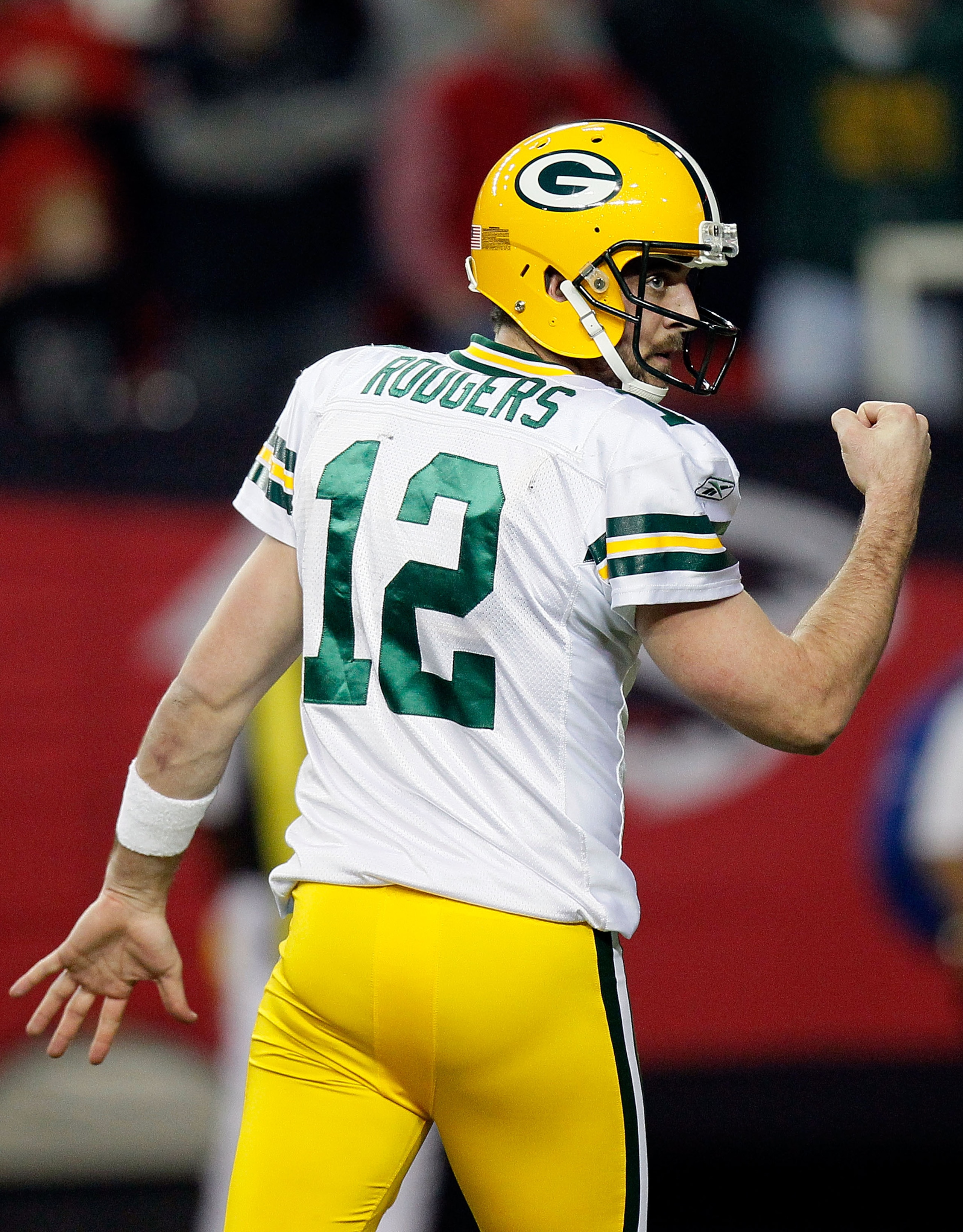 ATLANTA, GA - JANUARY 15:  Aaron Rodgers #12 of the Green Bay Packers reacts in the second quarter against the Atlanta Falcons during their 2011 NFC divisional playoff game at Georgia Dome on January 15, 2011 in Atlanta, Georgia. The Packers won 48-21.  (