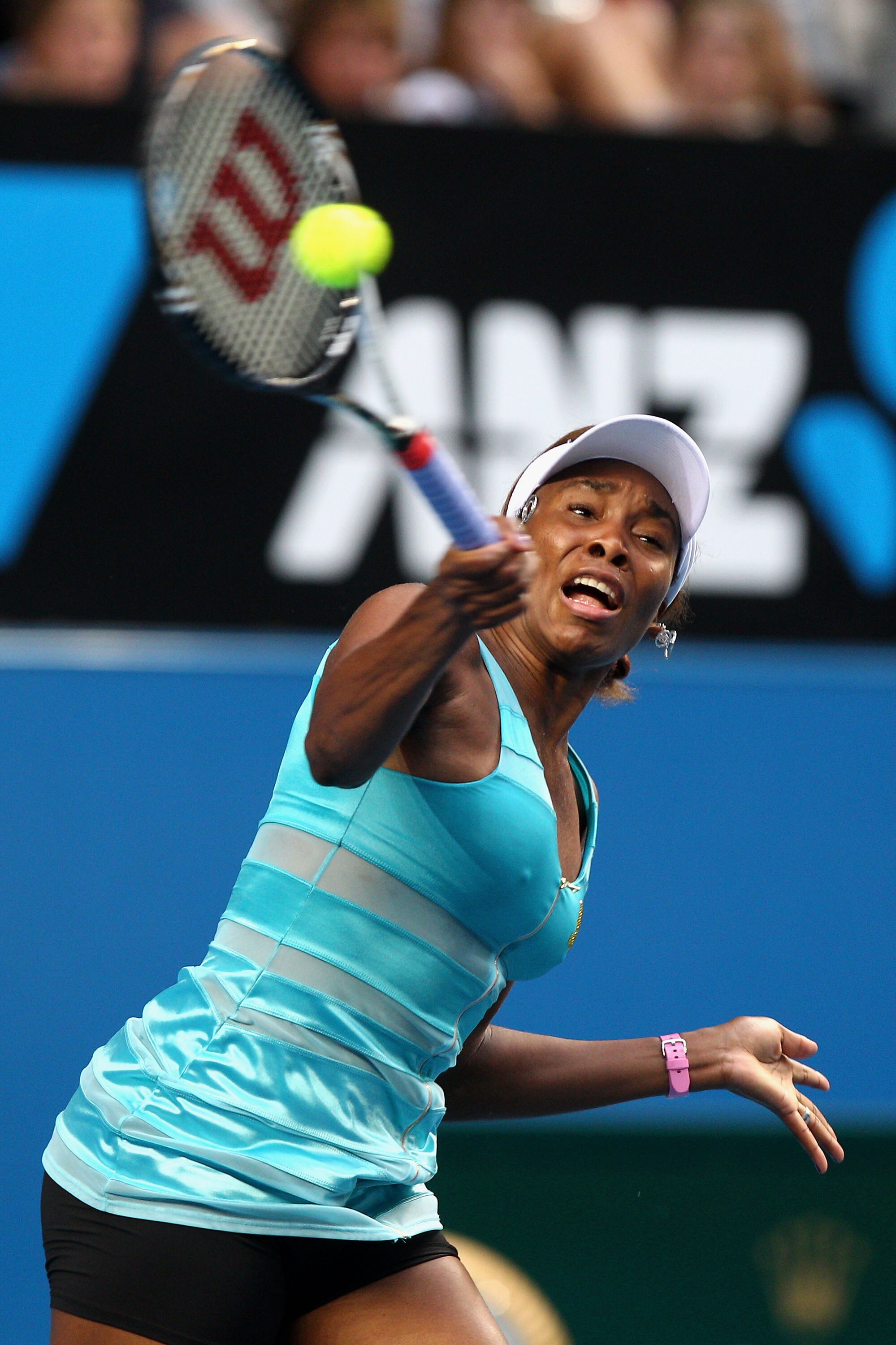 MELBOURNE, AUSTRALIA - JANUARY 17:  Venus Williams of the United States of America plays a forehand in her first round match against Sara Errani of Italy during day one of the 2011 Australian Open at Melbourne Park on January 17, 2011 in Melbourne, Austra