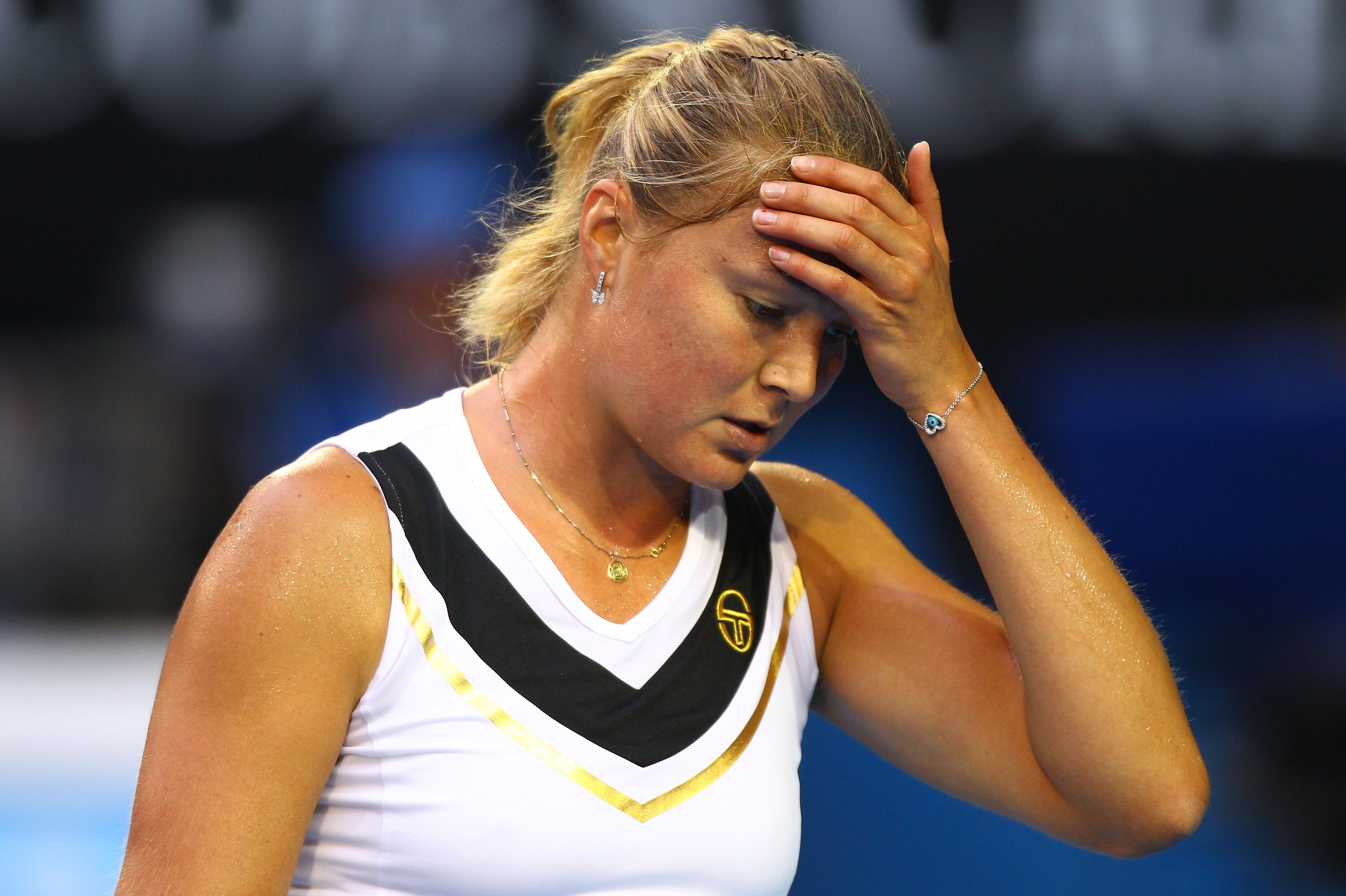 MELBOURNE, AUSTRALIA - JANUARY 18:  Dinara Safina of Russia reacts in her first round match against Kim Clijsters of Belgium during day two of the 2011 Australian Open at Melbourne Park on January 18, 2011 in Melbourne, Australia.  (Photo by Ryan Pierse/G