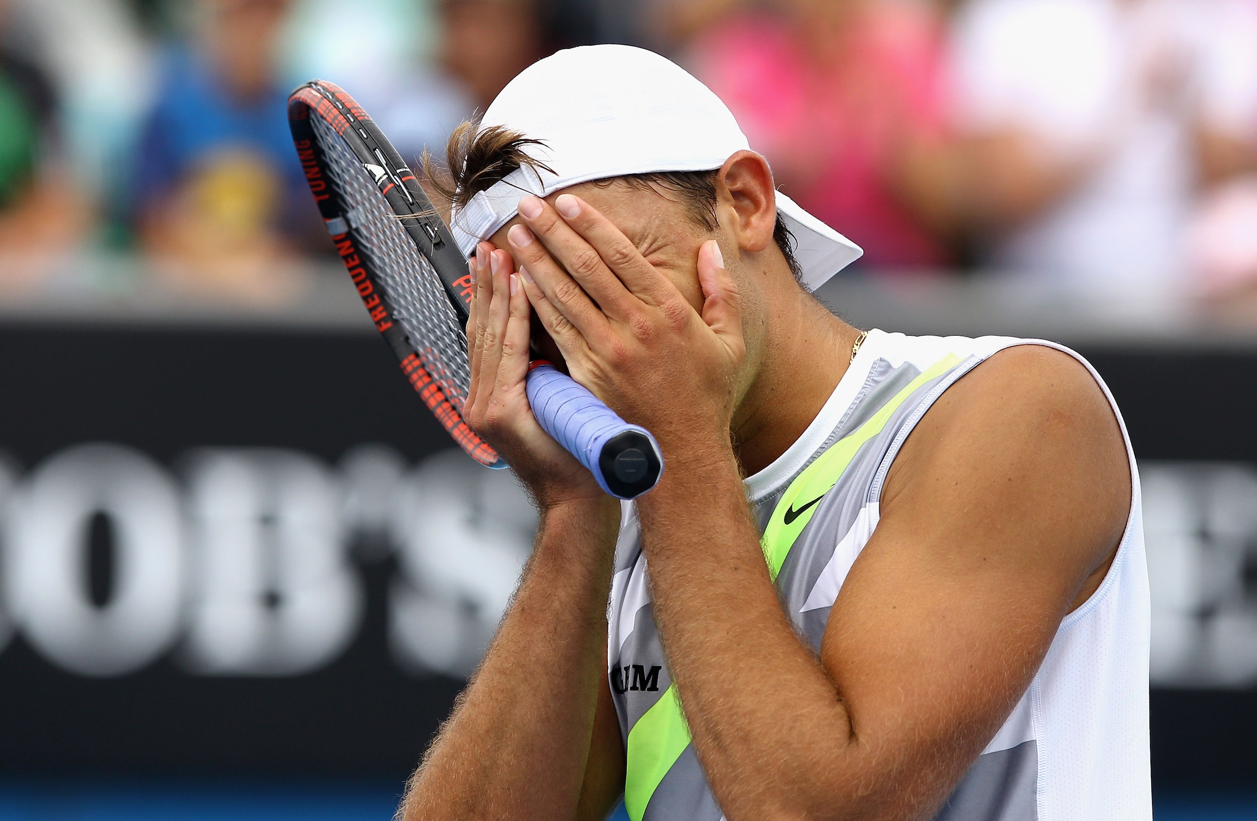 MELBOURNE, AUSTRALIA - JANUARY 17:  Lukasz Kubot of Poland celebrates after winning his first round match against Sam Querrey of the United States of America during day one of the 2011 Australian Open at Melbourne Park on January 17, 2011 in Melbourne, Au