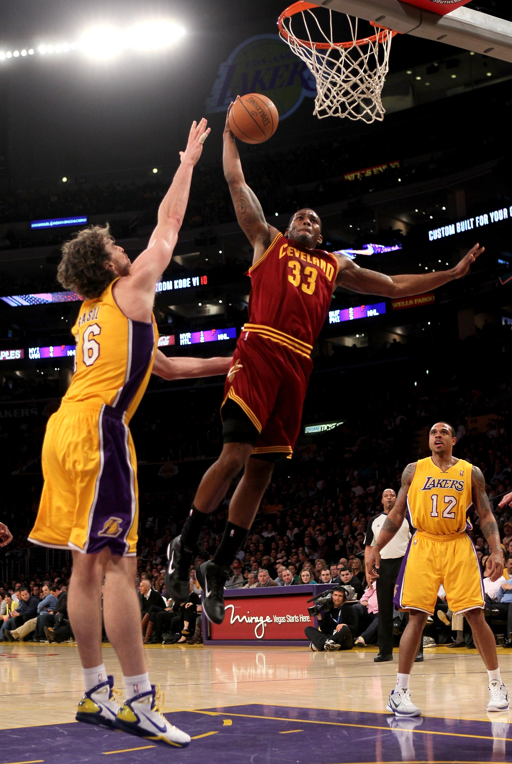 LOS ANGELES, CA - JANUARY 11:  Alonzo Gee #33 of the Cleveland Cavaliers dunks over Pau Gasol #16 of the Los Angeles Lakers at Staples Center on January 11, 2011 in Los Angeles, California.  The Lakers won 112-57.  NOTE TO USER: User expressly acknowledge