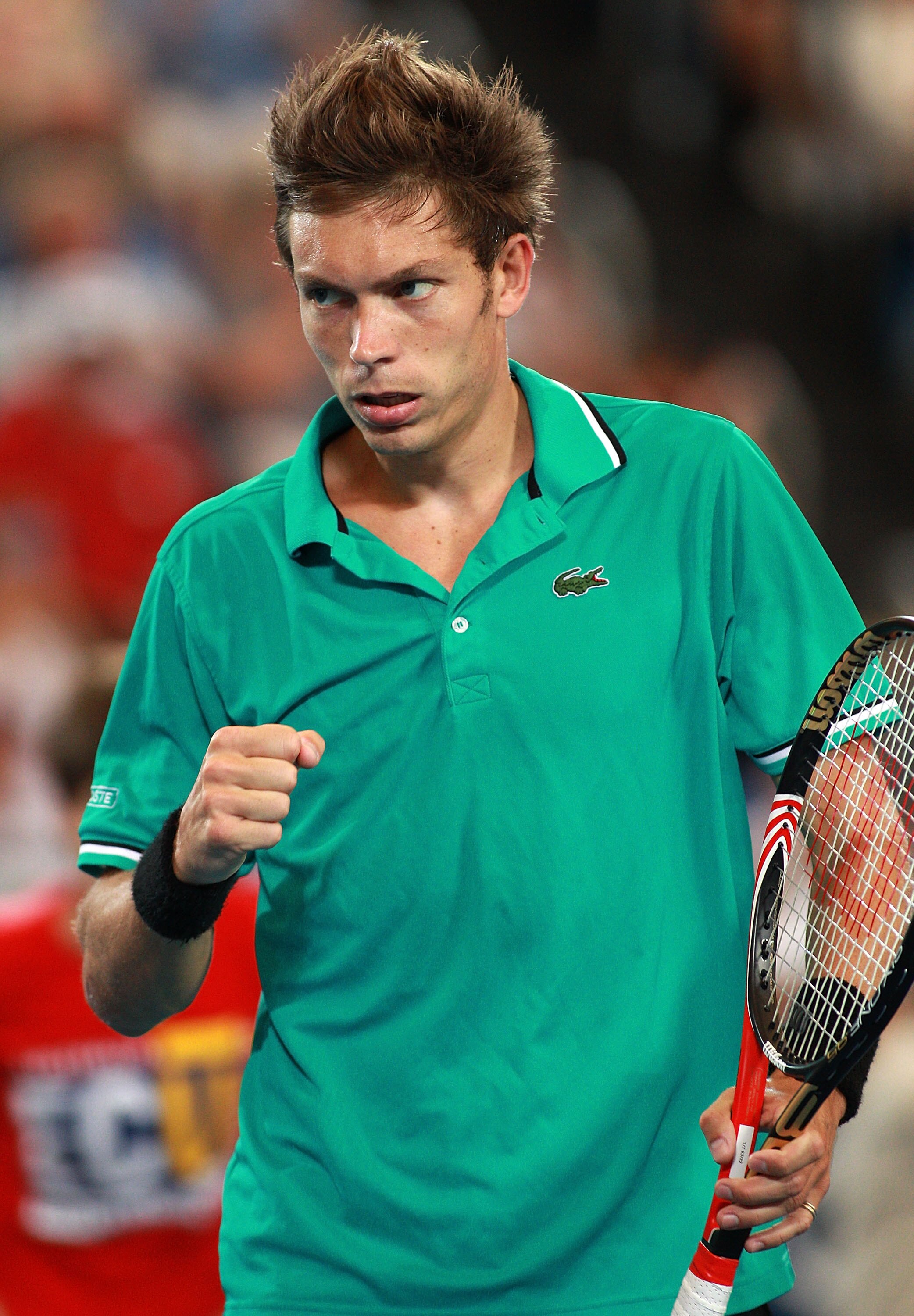 PERTH, AUSTRALIA - JANUARY 07:  Nicolas Mahut of France celebrates winning a point during his singles match against Potito Starace of Italy on day seven of the Hopman Cup on January 7, 2011 in Perth, Australia.  (Photo by Paul Kane/Getty Images)