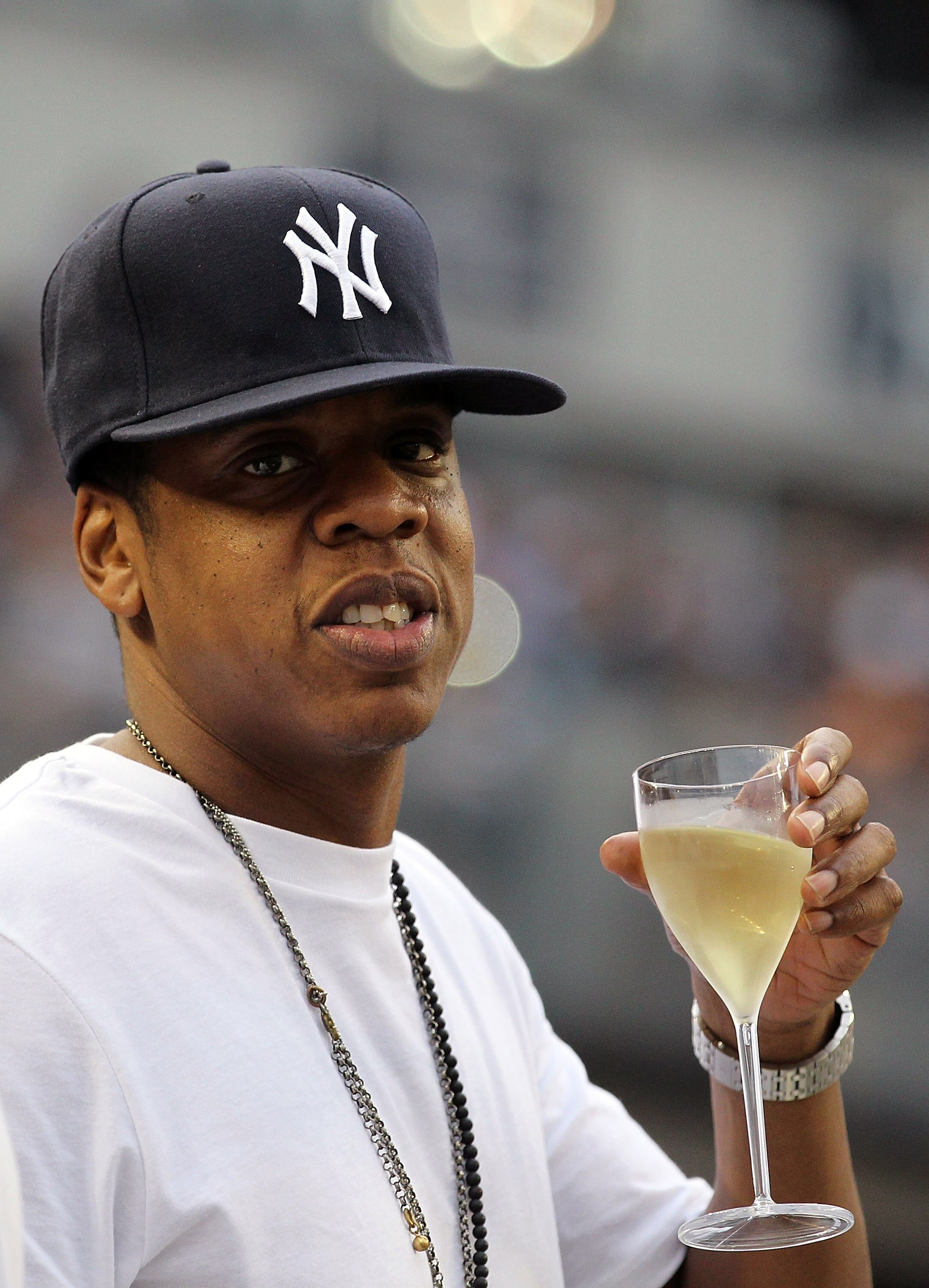 NEW YORK - JULY 23:  Rapper Jay-Z watches the game between the New York Yankees and the Kansas City Royals on July 23, 2010 at Yankee Stadium in the Bronx borough of New York City.  (Photo by Al Bello/Getty Images)