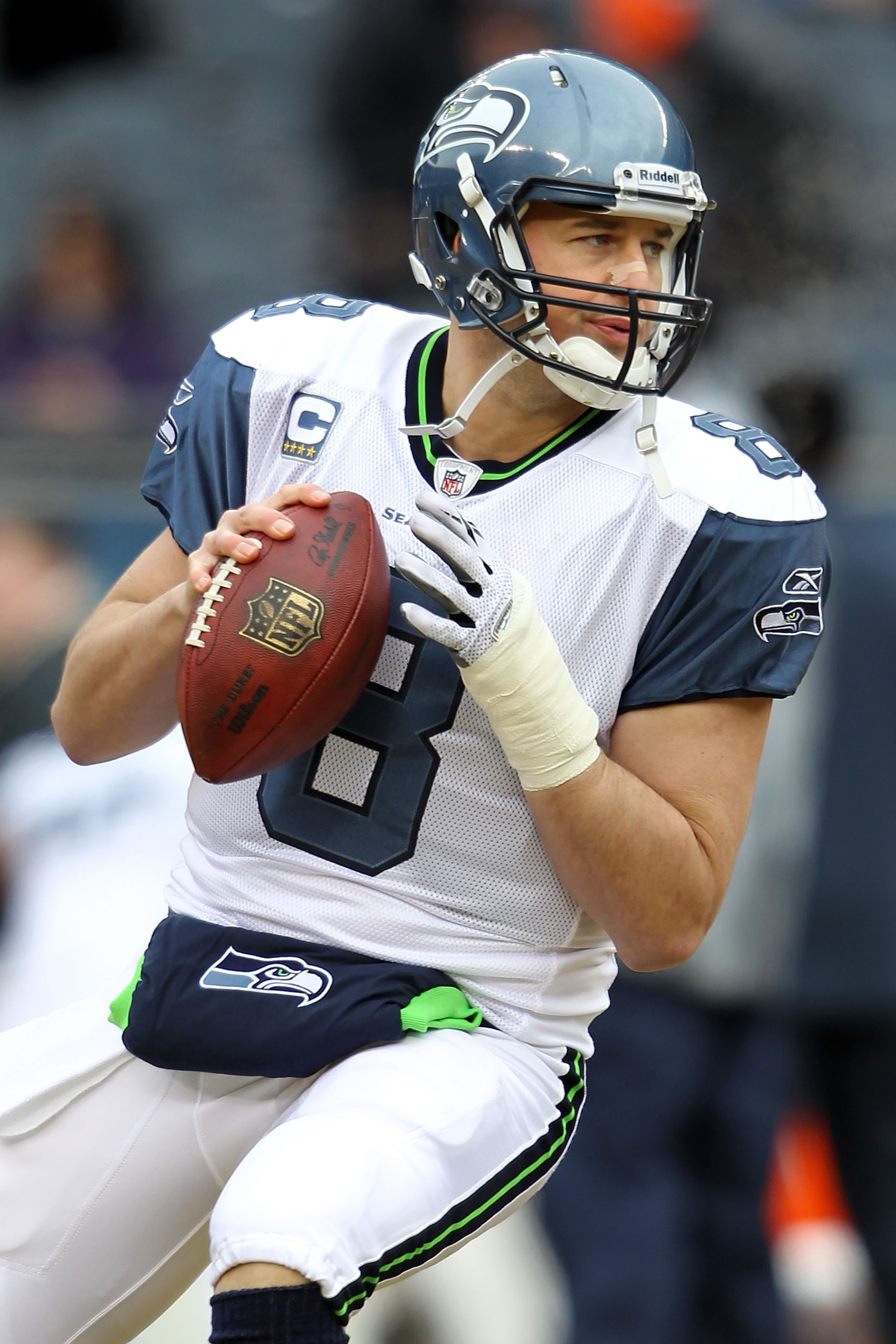 CHICAGO, IL - JANUARY 16:  Quarterback Matt Hasselbeck #8 of the Seattle Seahawks looks to throw the ball during pregame before taking on the Chicago Bears in the 2011 NFC divisional playoff game at Soldier Field on January 16, 2011 in Chicago, Illinois.