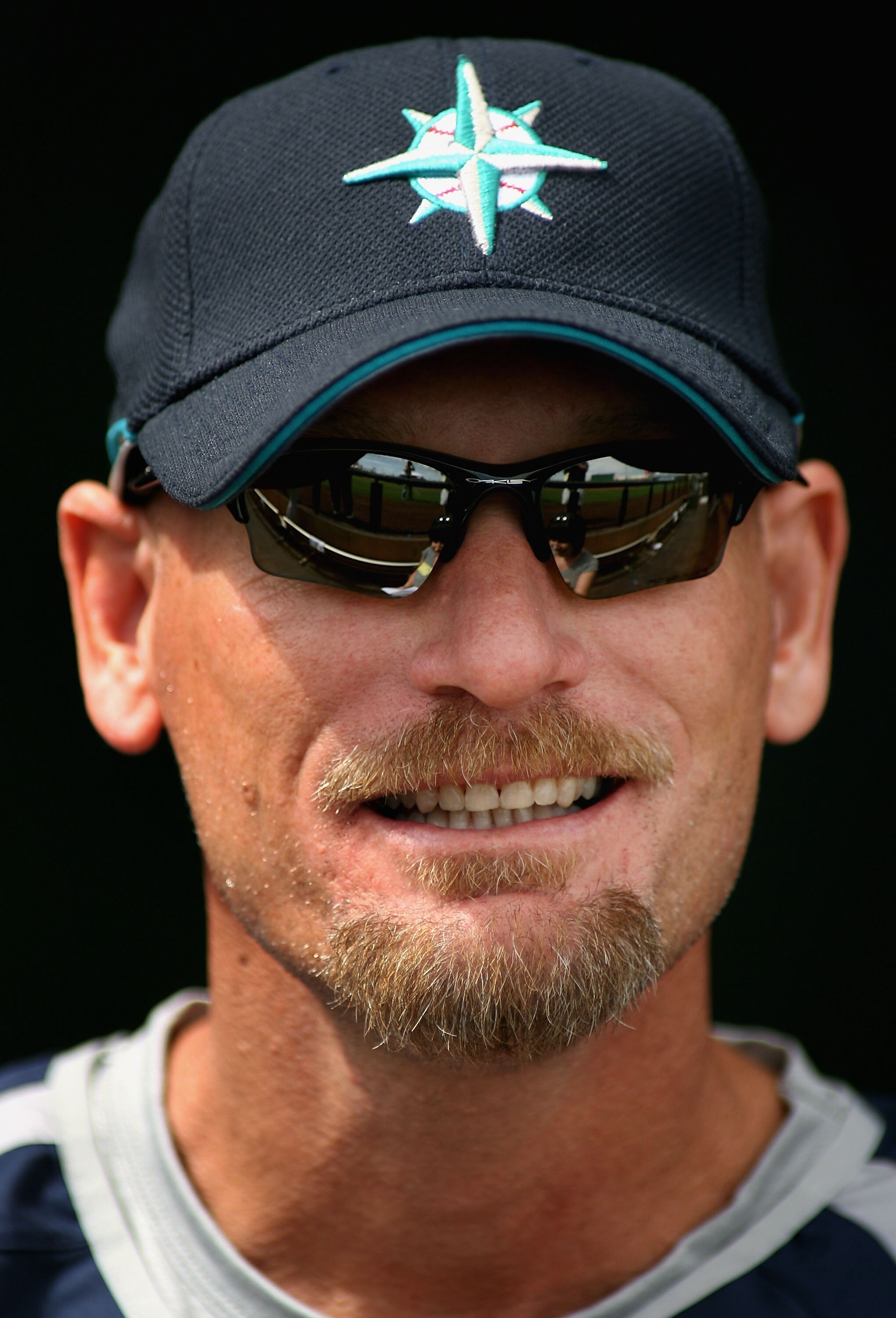 SURPRISE, AZ - MARCH 06:  Jay Buhner #19 of the Seattle Mariners looks on from the dugout before the MLB spring training game against the Texas Rangers on March 6, 2007 at Surprise Stadium in Surprise, Arizona. The Mariners defeated the Rangers 10-3.  (Ph