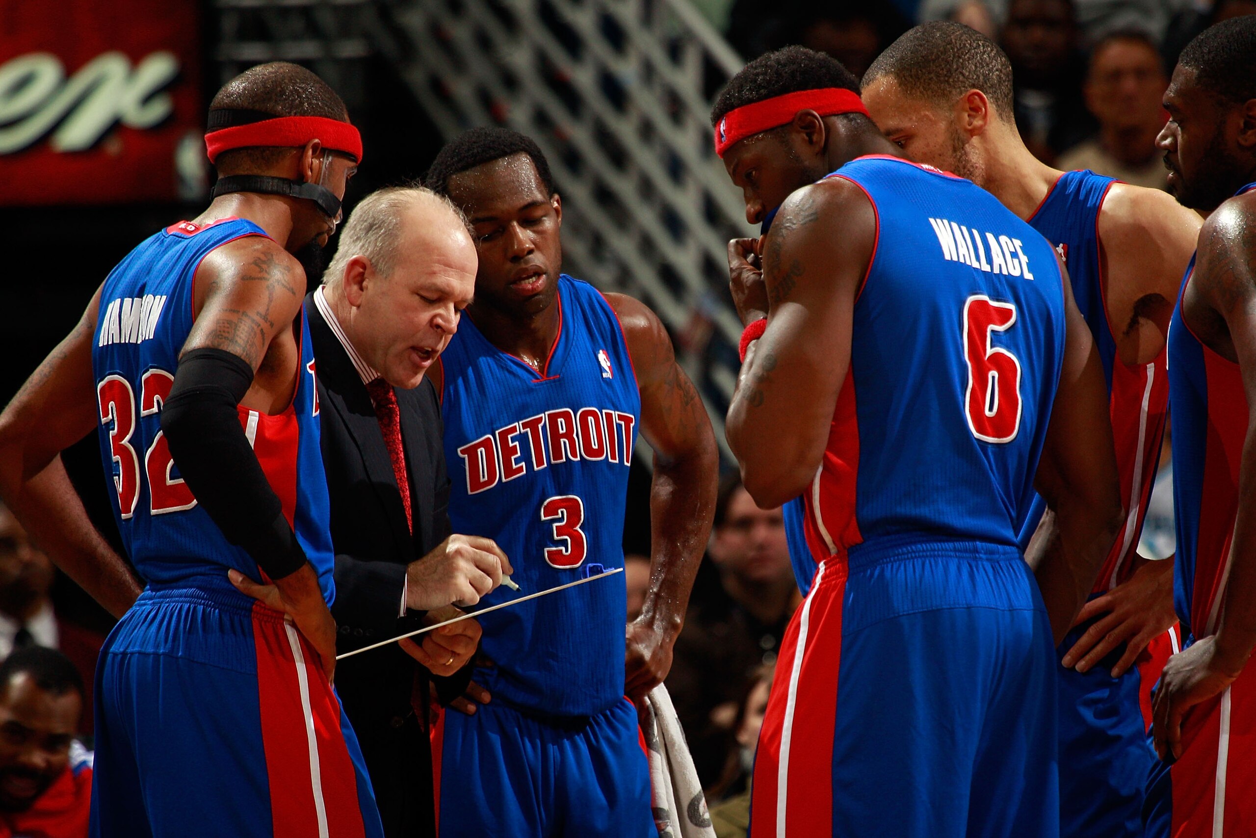 NEW ORLEANS, LA - DECEMBER 08: Head coach John Keuster of the Detroit Pistons talks with his team during a time out against the New Orleans Hornets at the New Orleans Arena on December 8, 2010 in New Orleans, Louisiana. NOTE TO USER: User expressly ackn NEW ORLEANS, LA - DECEMBER 08: Head coach John Keuster of the Detroit Pistons talks with his team during a time out against the New Orleans Hornets at the New Orleans Arena on December 8, 2010 in New Orleans, Louisiana. NOTE TO USER: User expressly ackn