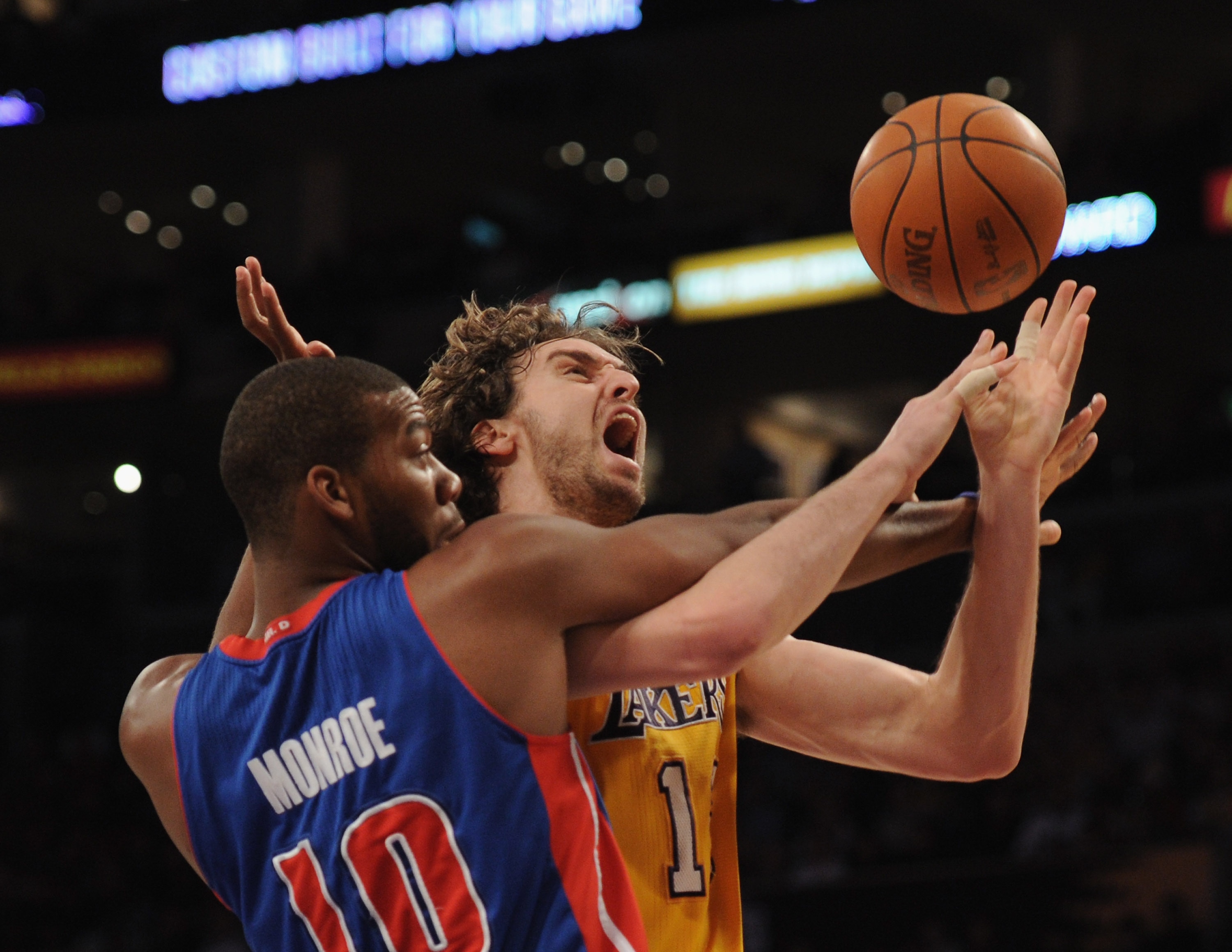 LOS ANGELES, CA - JANUARY 04:  Pau Gasol #16 of the Los Angeles Lakers is fouled by Greg Monroe #10 of the Detroit Pistons during the first half at the Staples Center on January 4, 2011 in Los Angeles, California. NOTE TO USER: User expressly acknowledges