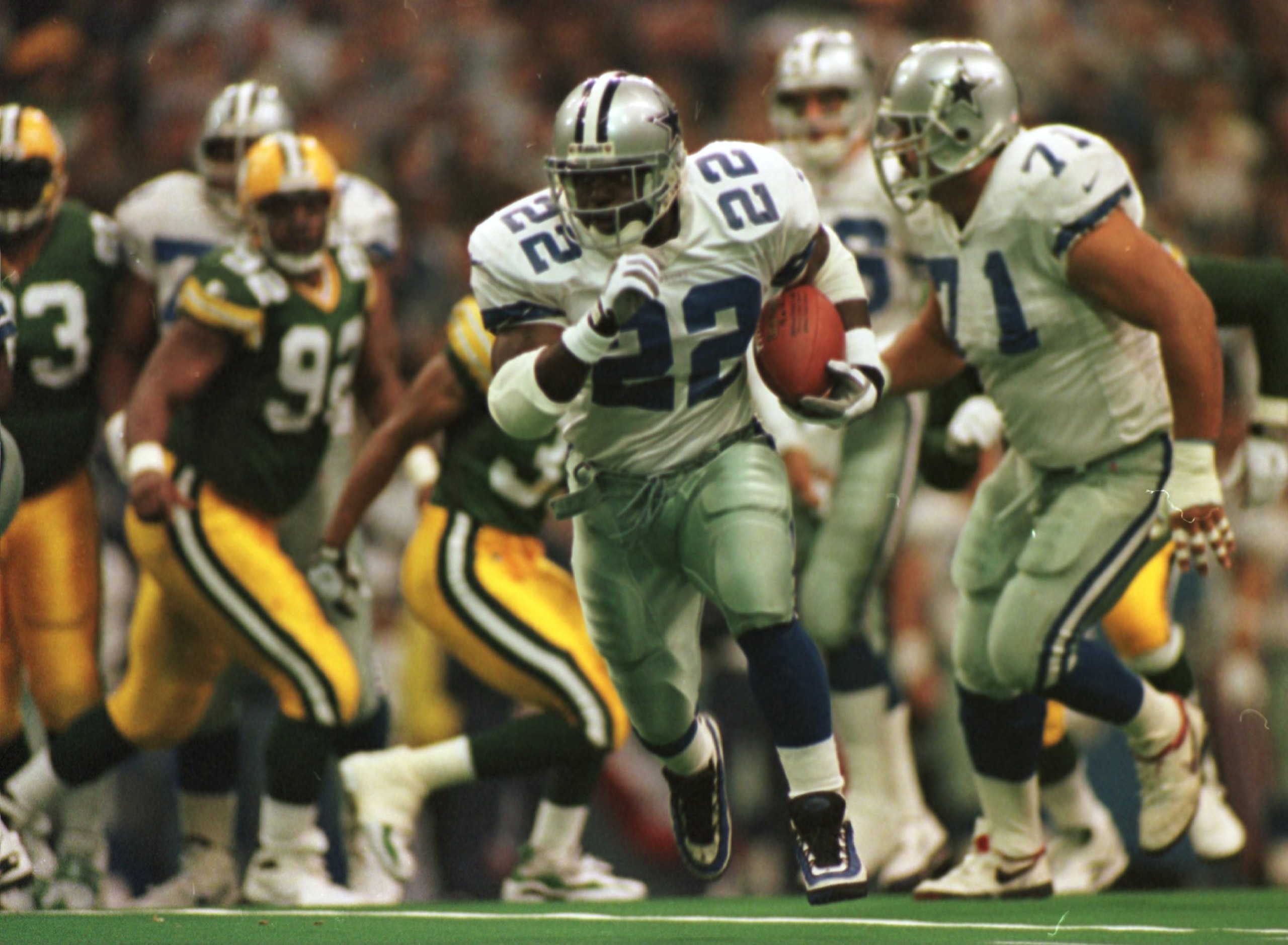 18 Nov 1996: Running back Emmitt Smith of the Dallas Cowboys runs with the ball during the first half of the Cowboys game against the Green Bay Packers at Texas Stadium in Irving, Texas. Mandatory Credit: Brian Bahr/ALLSPORT 18 Nov 1996: Running back Emmitt Smith of the Dallas Cowboys runs with the ball during the first half of the Cowboys game against the Green Bay Packers at Texas Stadium in Irving, Texas. Mandatory Credit: Brian Bahr/ALLSPORT