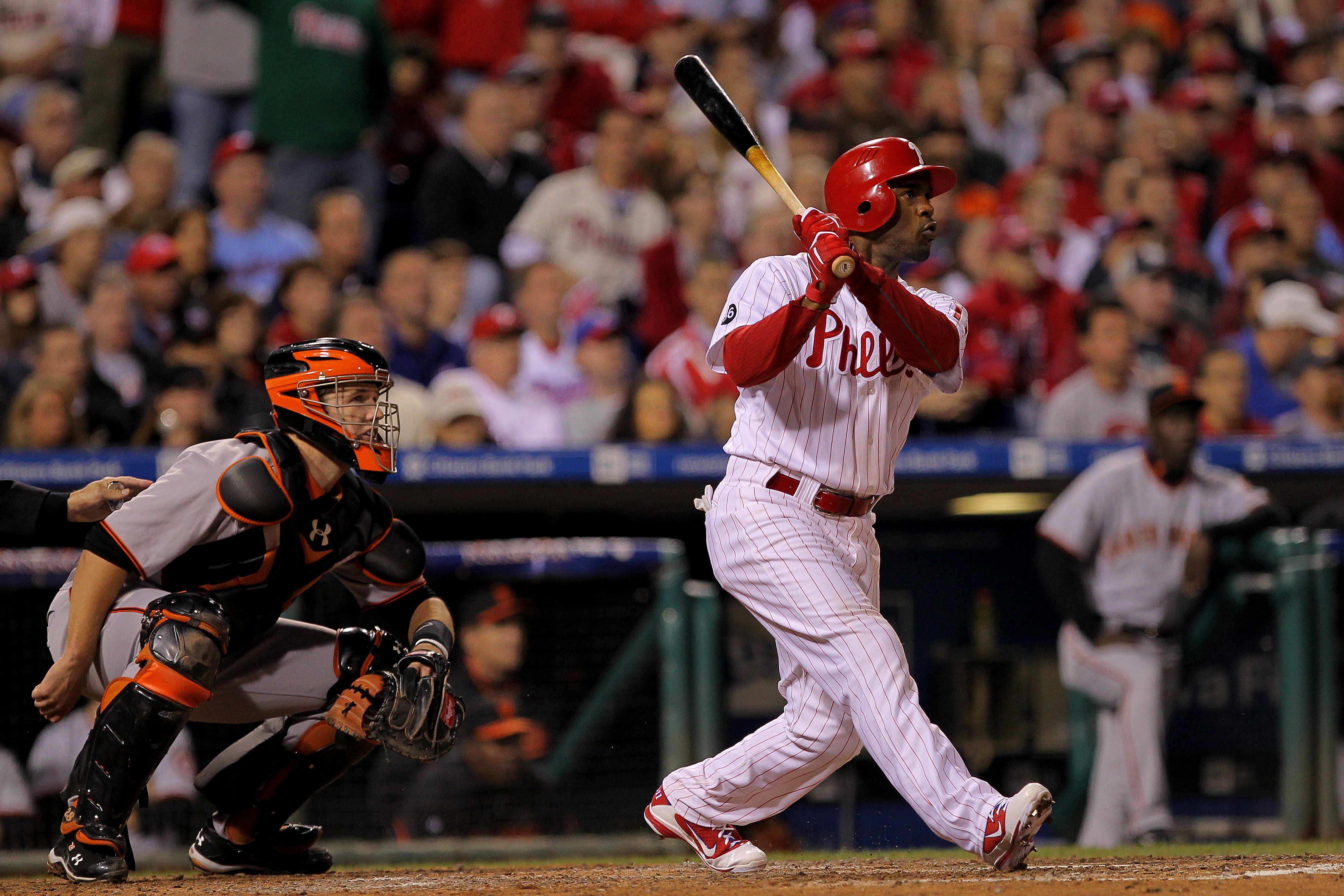 PHILADELPHIA - OCTOBER 17:  Jimmy Rollins #11 of the Philadelphia Phillies hits a three run double to left field in the seventh inning against the San Francisco Giants in Game Two of the NLCS during the 2010 MLB Playoffs at Citizens Bank Park on October 1