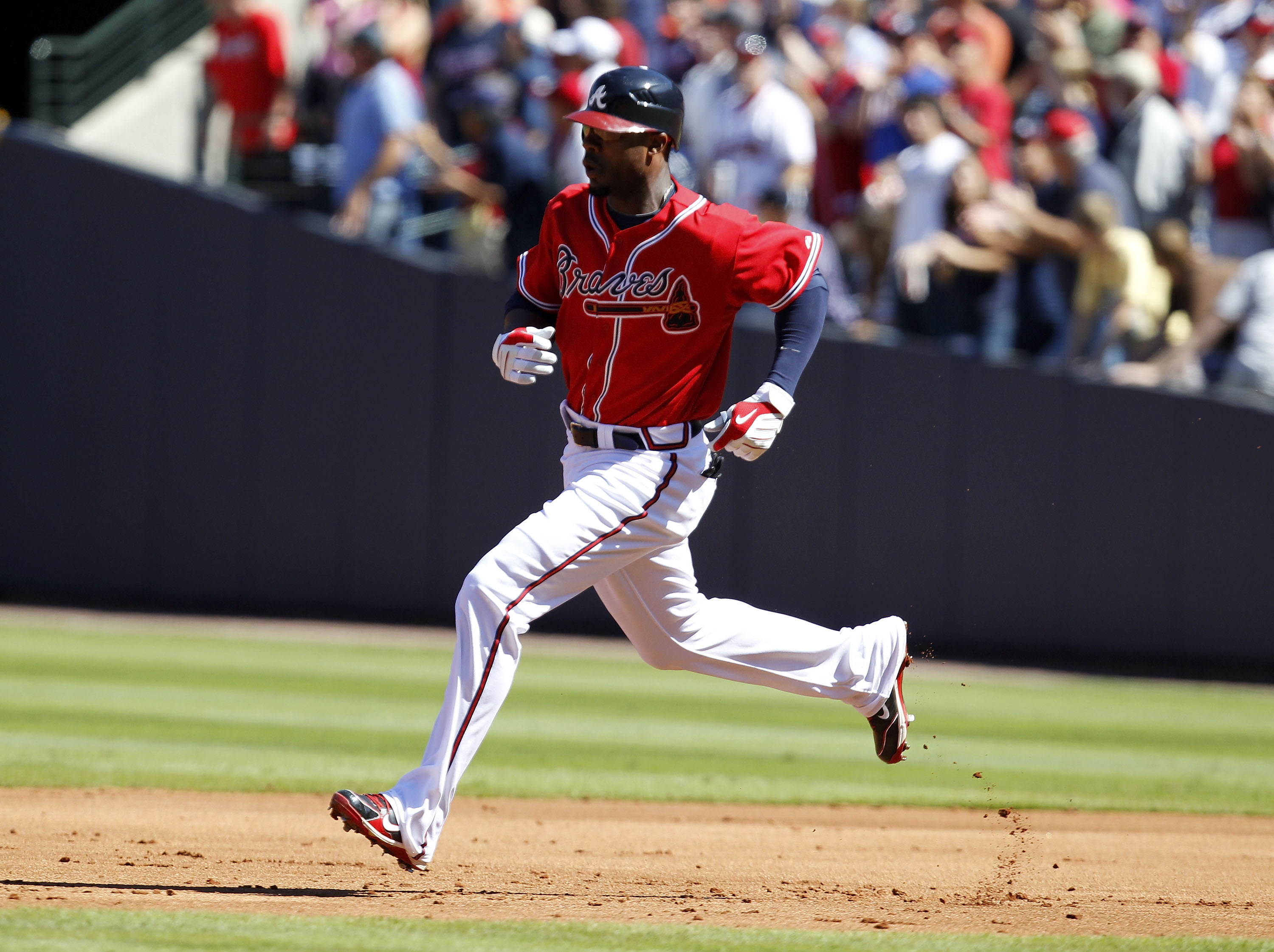 ATLANTA - OCTOBER 3:  RIght fielder Jason Heyward #22 of the Atlanta Braves runs for a triple during the game against the Philadelphia Phillies at Turner Field on October 3, 2010 in Atlanta, Georgia.  The Braves beat the Phillies 8-7.  (Photo by Mike Zarr