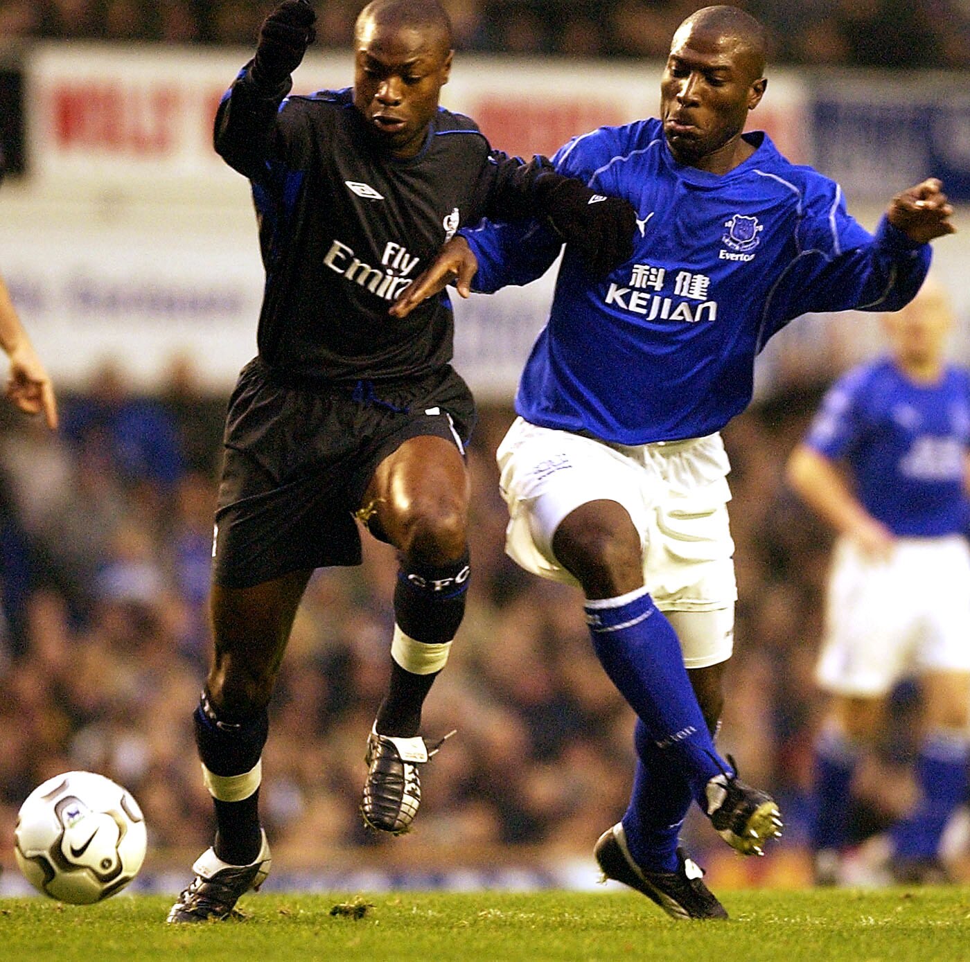 LIVERPOOL, ENGLAND - DECEMBER 7:   William Gallas of  Chelsea is challenged by Everton captain Kevin Campbell during the FA Barclaycard Premiership match between Everton and Chelsea at Goodison Park in Liverpool on December 7, 2002. (Photo by Stu Forster/