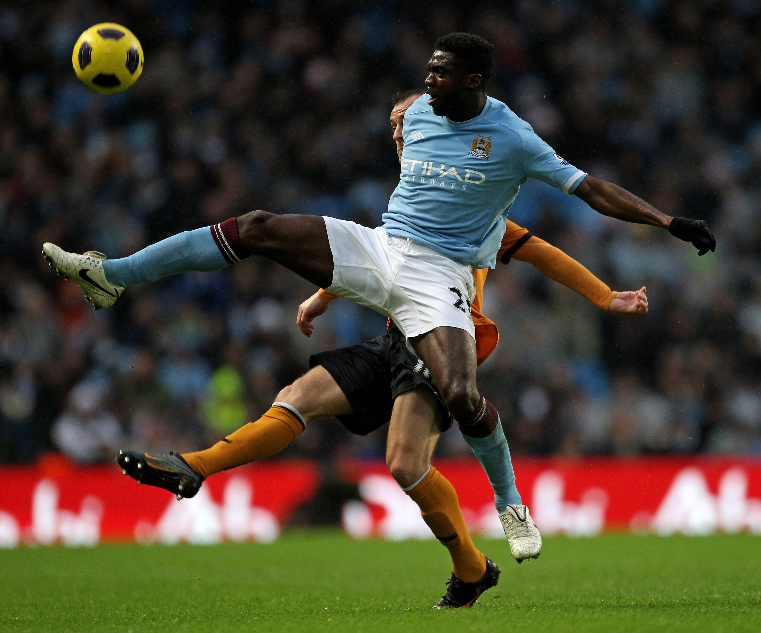 MANCHESTER, UNITED KINGDOM - JANUARY 15:   Steven Fletcher of Wolverhampton Wanderers competes with Kolo Toure of Manchester City during the Barclays Premier League match between Manchester City and Wolverhampton Wanderers at the City of Manchester Stadiu