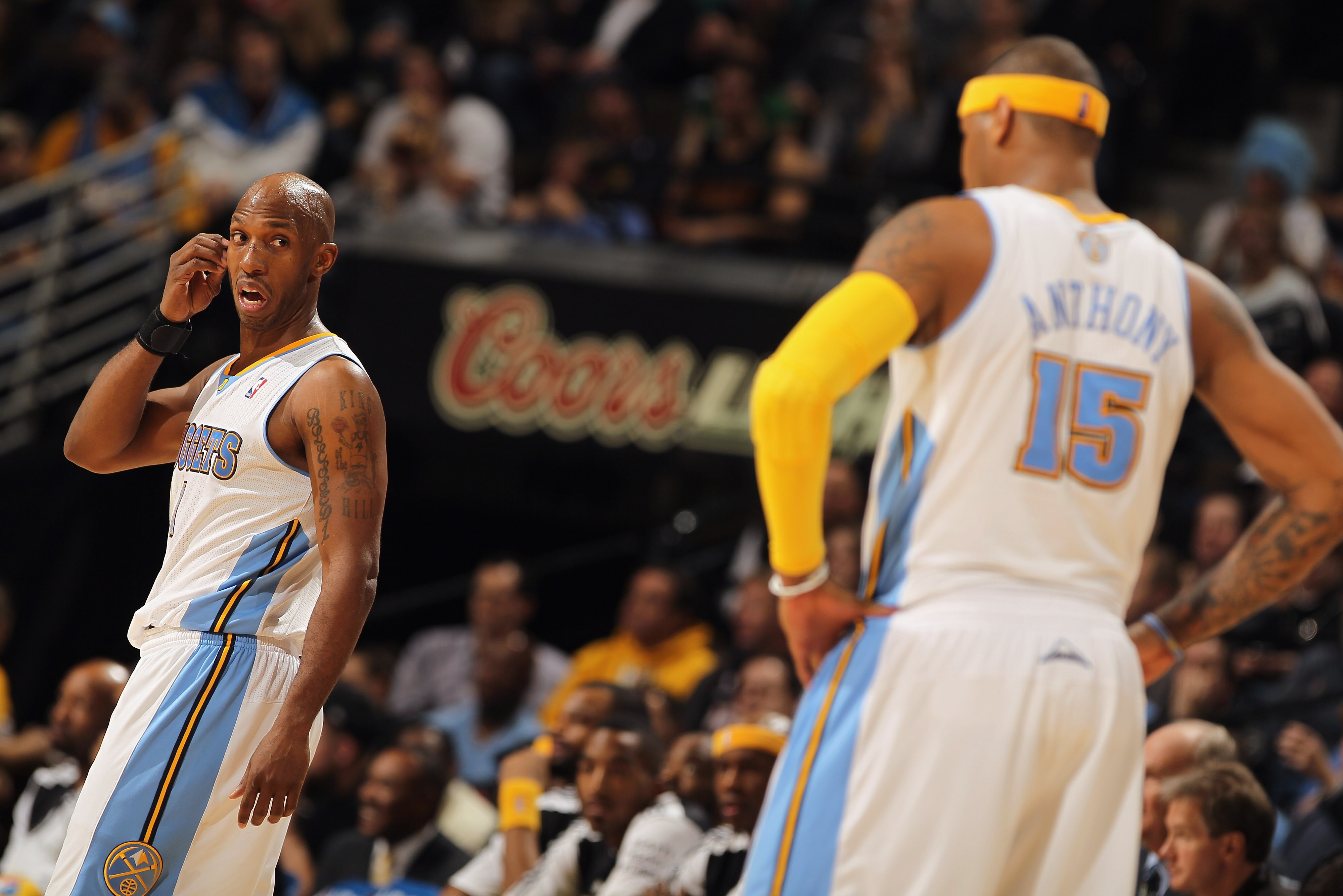 DENVER, CO - JANUARY 13: Chauncey Billups #1 and Carmelo Anthony #15 of the Denver Nuggets look on during a break in the action against the Miami Heat at the Pepsi Center on January 13, 2011 in Denver, Colorado. The Nuggets defeated the Heat 130-102. NOT DENVER, CO - JANUARY 13: Chauncey Billups #1 and Carmelo Anthony #15 of the Denver Nuggets look on during a break in the action against the Miami Heat at the Pepsi Center on January 13, 2011 in Denver, Colorado. The Nuggets defeated the Heat 130-102. NOT