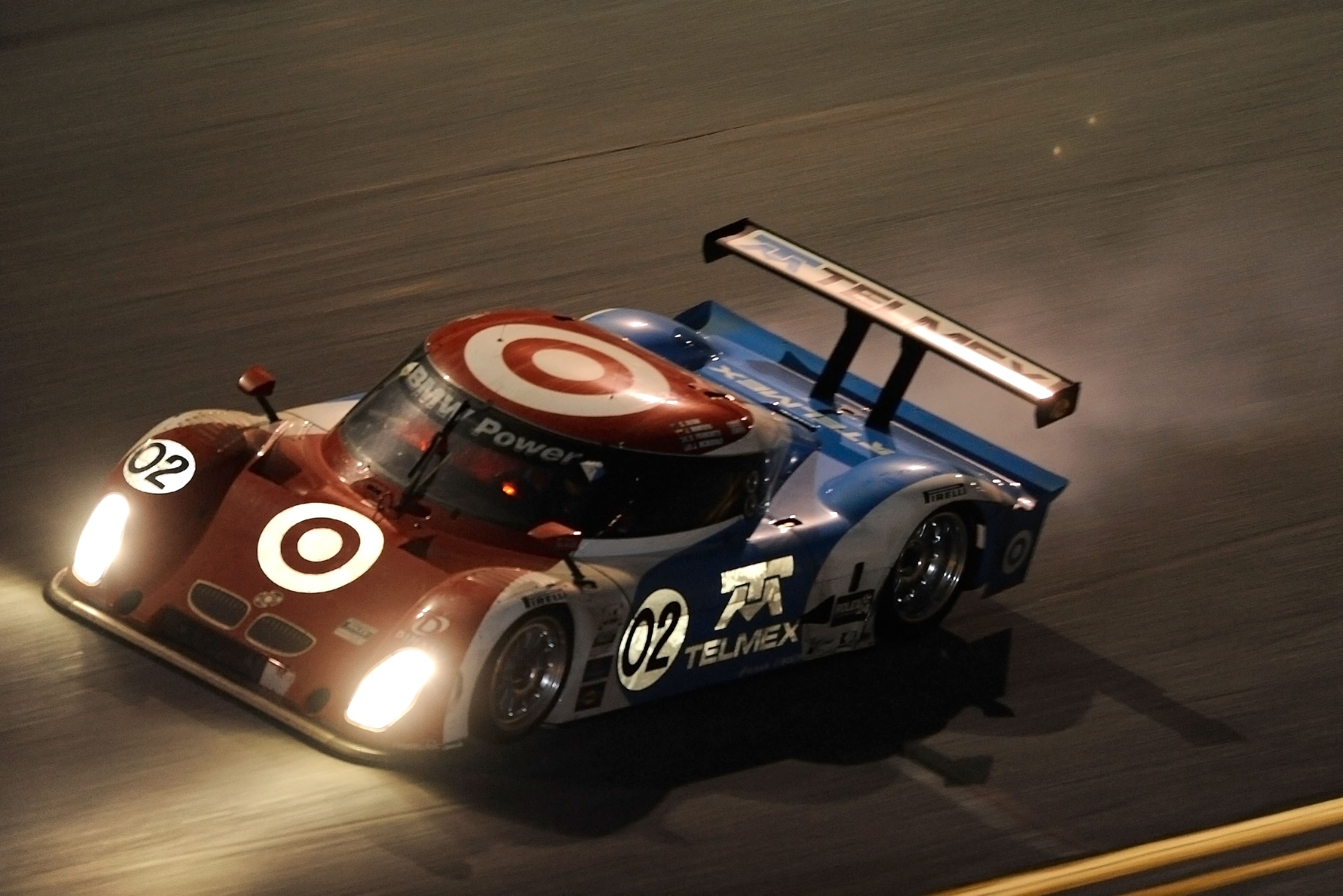DAYTONA BEACH, FL - JANUARY 30: The #02 Target/Telemax BMW Riley driven by drivers Scott Dixon, Juan Pablo Montoya, Dario Franchitti & Jamie McMurray looses an engine during the Grand-Am Rolex 24 at Daytona held at Daytona International Speedway on Janua DAYTONA BEACH, FL - JANUARY 30: The #02 Target/Telemax BMW Riley driven by drivers Scott Dixon, Juan Pablo Montoya, Dario Franchitti & Jamie McMurray looses an engine during the Grand-Am Rolex 24 at Daytona held at Daytona International Speedway on Janua