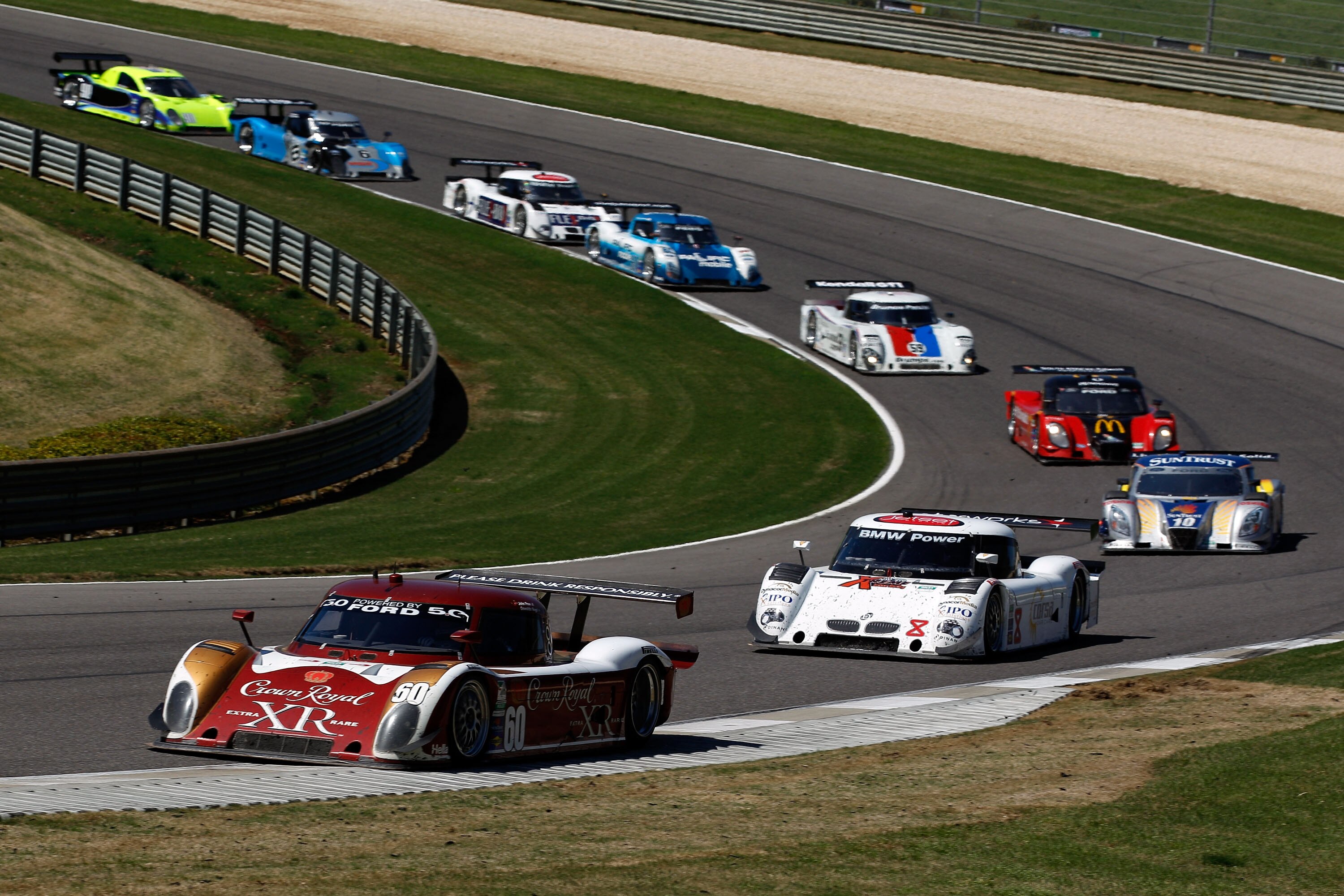 LEEDS, AL - APRIL 10:  Oswaldo Negri Jr., and John Pew, drivers of the #60 Michael Shank Racing Ford Riley, lead Ryan Dalziel and Mike Forest, drivers of the #8 Starworks Motorsport BMW Riley at the Grand-Am Porsche 250 at the Barber Motorsports Park on A