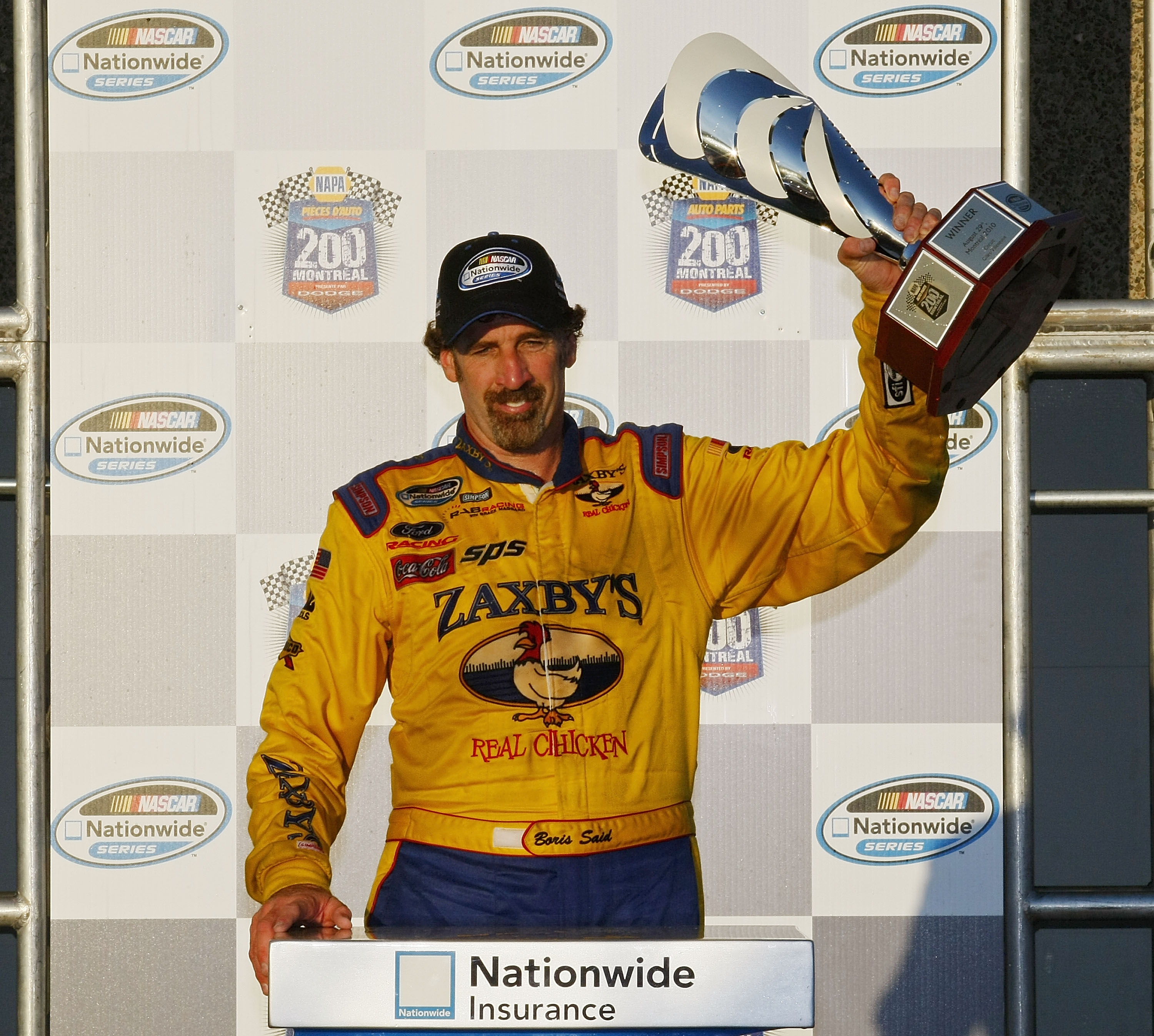 MONTREAL, QC - AUGUST 29:  Boris Said, driver of the #09 Zaxby's/PFC Ford, celebrates in victory lane after winning the NAPA Auto Parts 200 at Circuit Gilles-Villeneuve on August 29, 2010 in Montreal, Canada.  (Photo by Geoff Burke/Getty Images)