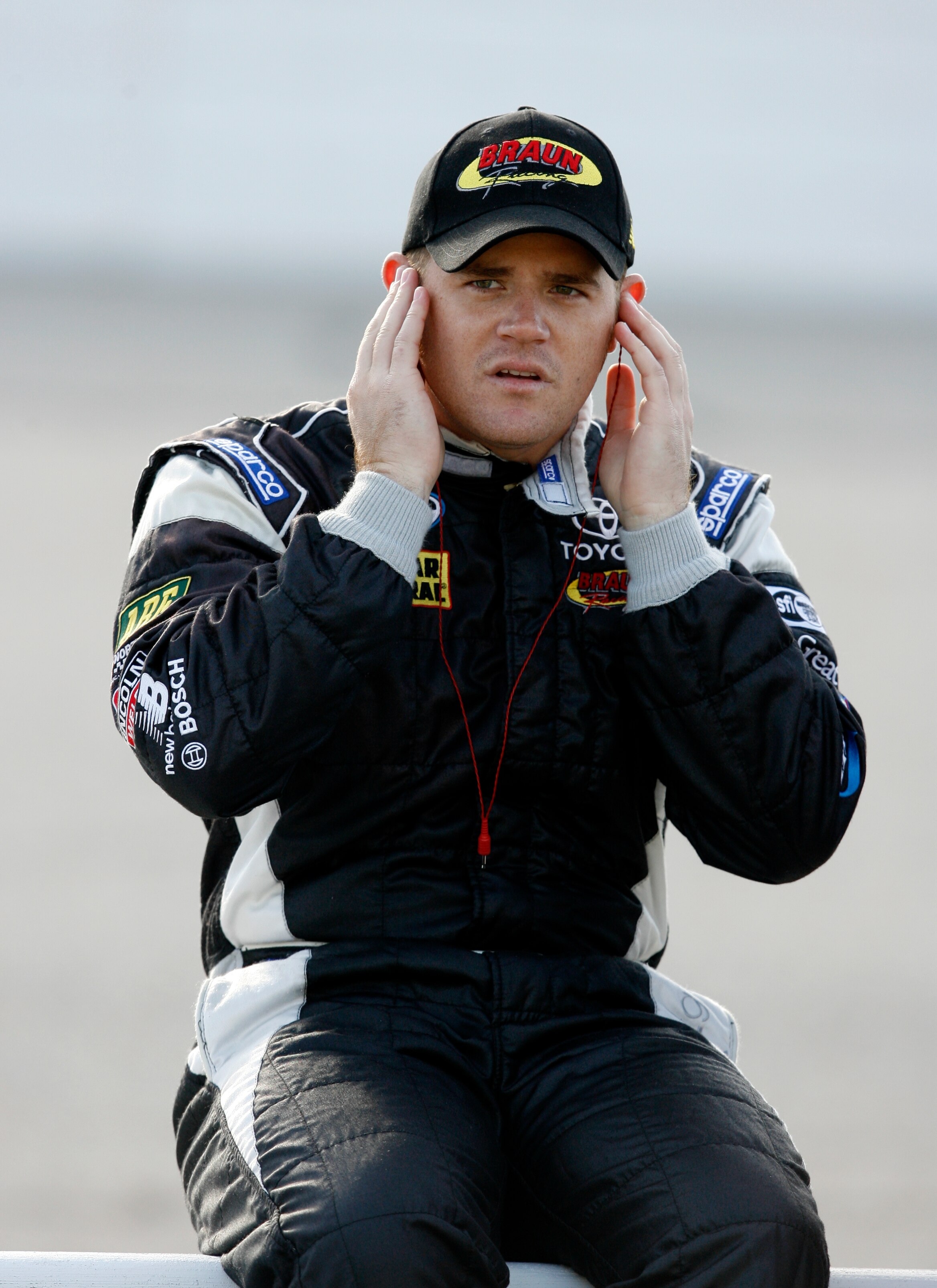 MEMPHIS, TN - OCTOBER 24:   Justin Marks, driver of the #10 Cinstruct Corps Toyota sits on the wall on the grid during qualifying for the NASCAR Nationwide series Kroger 'On Track For Cure' 250 race at the Memphis Motorsports Park on October 24, 2009 in M